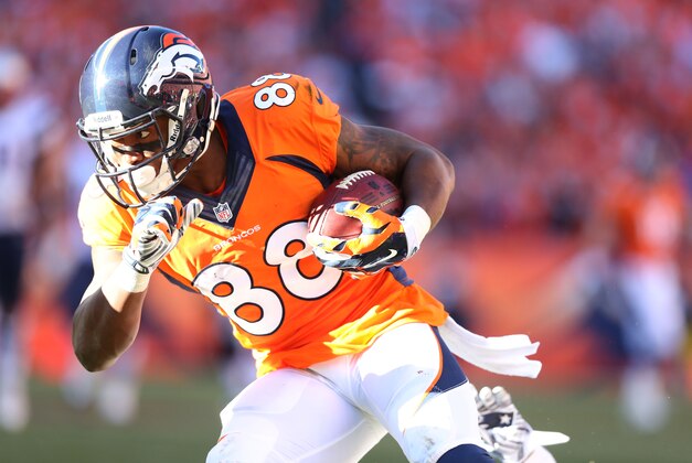 Jan 19, 2014; Denver, CO, USA; Denver Broncos receiver Demaryius Thomas (88) runs after a reception in the second half during the 2013 AFC Championship game at Sports Authority Field against the New England Patriots at Mile High. Mandatory Credit: Matthew Emmons-USA TODAY Sports