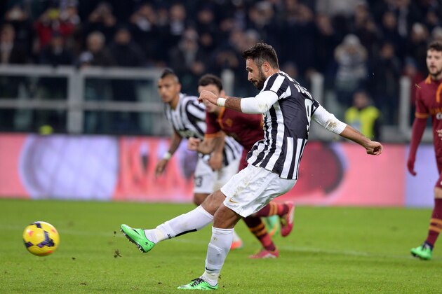 TURIN, ITALY - JANUARY 05:  Mirko Vucinic of FC Juventus scores the third goal during the Serie A match between Juventus and AS Roma at Juventus Arena on January 5, 2014 in Turin, Italy.  (Photo by Claudio Villa/Getty Images)