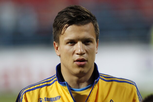 Ukraine's Yevhen Konoplyanka stands during the playing of his country's national anthem before the start of a 2014 World Cup group H qualifying soccer match against Montenegro, at City Stadium in Podgorica, Montenegro, Friday, June 7, 2013.(AP Photo/Darko Vojinovic)