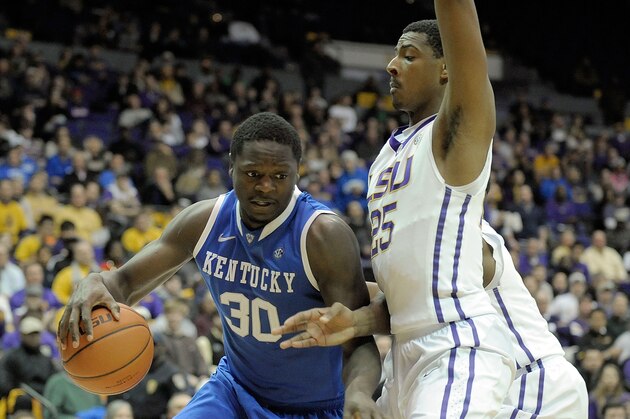 BATON ROUGE, LA - JANUARY 28:  Julius Randle #30 of the Kentucky Wildcats is guarded by Jordan Mickey #25 of the LSU Tigers during a game at the Pete Maravich Assembly Center on January 28, 2014 in Baton Rouge, Louisiana.  LSU won the game 87-82.  (Photo by Stacy Revere/Getty Images)