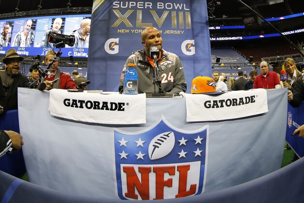 Jan 28, 2014; Newark, NJ, USA; Denver Broncos cornerback Champ Bailey (24) speaks to the media during Media Day for Super Bowl XLVIII at Prudential Center. Mandatory Credit: Adam Hunger-USA TODAY Sports