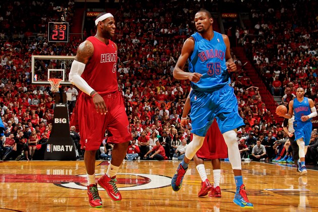 MIAMI, FL - DECEMBER 25: Kevin Durant #35 of the Oklahoma City Thunder and LeBron James #6 of the Miami Heat wait to resume play during a Christmas Day game on December 25, 2012 at American Airlines Arena in Miami, Florida. NOTE TO USER: User expressly acknowledges and agrees that, by downloading and/or using this photograph, user is consenting to the terms and conditions of the Getty Images License Agreement. Mandatory copyright notice: Copyright NBAE 2012 (Photo by Issac Baldizon/NBAE via Getty Images) MIAMI, FL - DECEMBER 25: Kevin Durant #35 of the Oklahoma City Thunder and LeBron James #6 of the Miami Heat wait to resume play during a Christmas Day game on December 25, 2012 at American Airlines Arena in Miami, Florida. NOTE TO USER: User expressly acknowledges and agrees that, by downloading and/or using this photograph, user is consenting to the terms and conditions of the Getty Images License Agreement. Mandatory copyright notice: Copyright NBAE 2012 (Photo by Issac Baldizon/NBAE via Getty Images)
