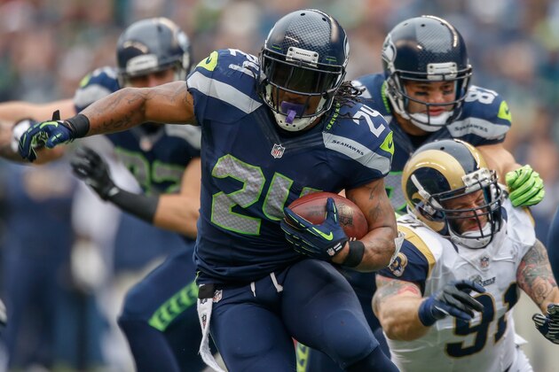 SEATTLE, WA - DECEMBER 29:  Running back Marshawn Lynch #24 of the Seattle Seahawks rushes against the St. Louis Rams at CenturyLink Field on December 29, 2013 in Seattle, Washington.  (Photo by Otto Greule Jr/Getty Images)