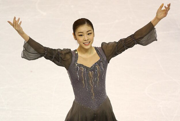 Mar 16, 2013; London, ON, Canada; Yuna Kim (KOR) skates during the ladies free program at the World Figure Skating Championships at Budweiser Gardens. Mandatory Credit: Tom Szczerbowski-USA TODAY Sports