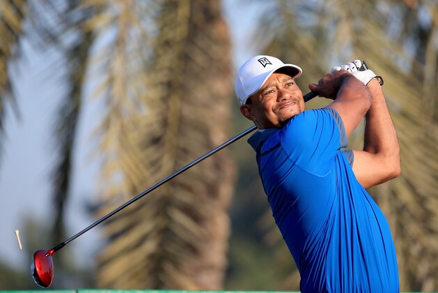 DUBAI, UNITED ARAB EMIRATES - JANUARY 29:  Tiger Woods of the USA in action during the pro-am as a preview for the 2014 Omega Dubai desert Classic on the Majlis Course at The Emirates Golf Club on January 29, 2014 in Dubai, United Arab Emirates.  (Photo by David Cannon/Getty Images)