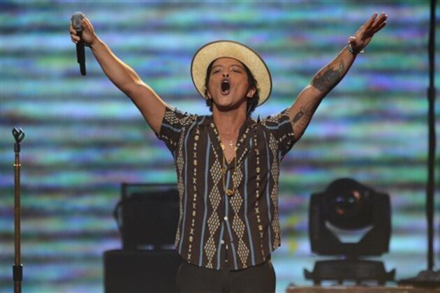 Bruno Mars performs at IHeartRadio Music Festival, day 2, Saturday, Sept. 21, 2013 in Las Vegas, NV. (Photo by Al Powers/Powers Imagery/Invision /AP)