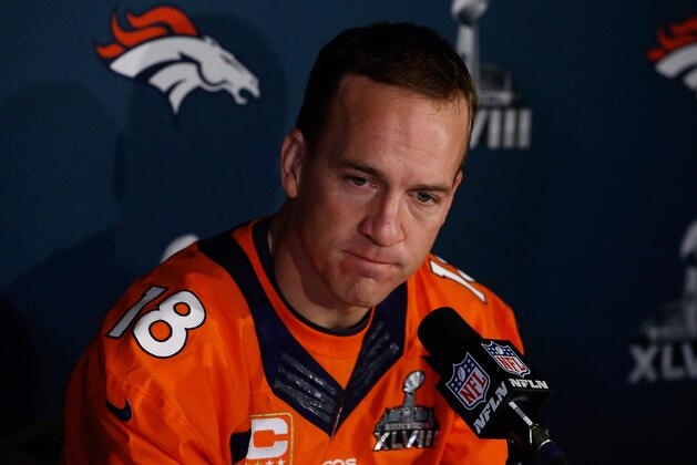 JERSEY CITY, NJ - JANUARY 29:    Peyton Manning #18 of the Denver Broncos speaks to the media during an availability January 29, 2014 in Jersey City, New Jersey. The Denver Broncos and Seattle Seahawks will meet at Super Bowl XLVIII at Metlife Stadium on February 2, 2014. (Photo by Jeff Zelevansky/Getty Images)