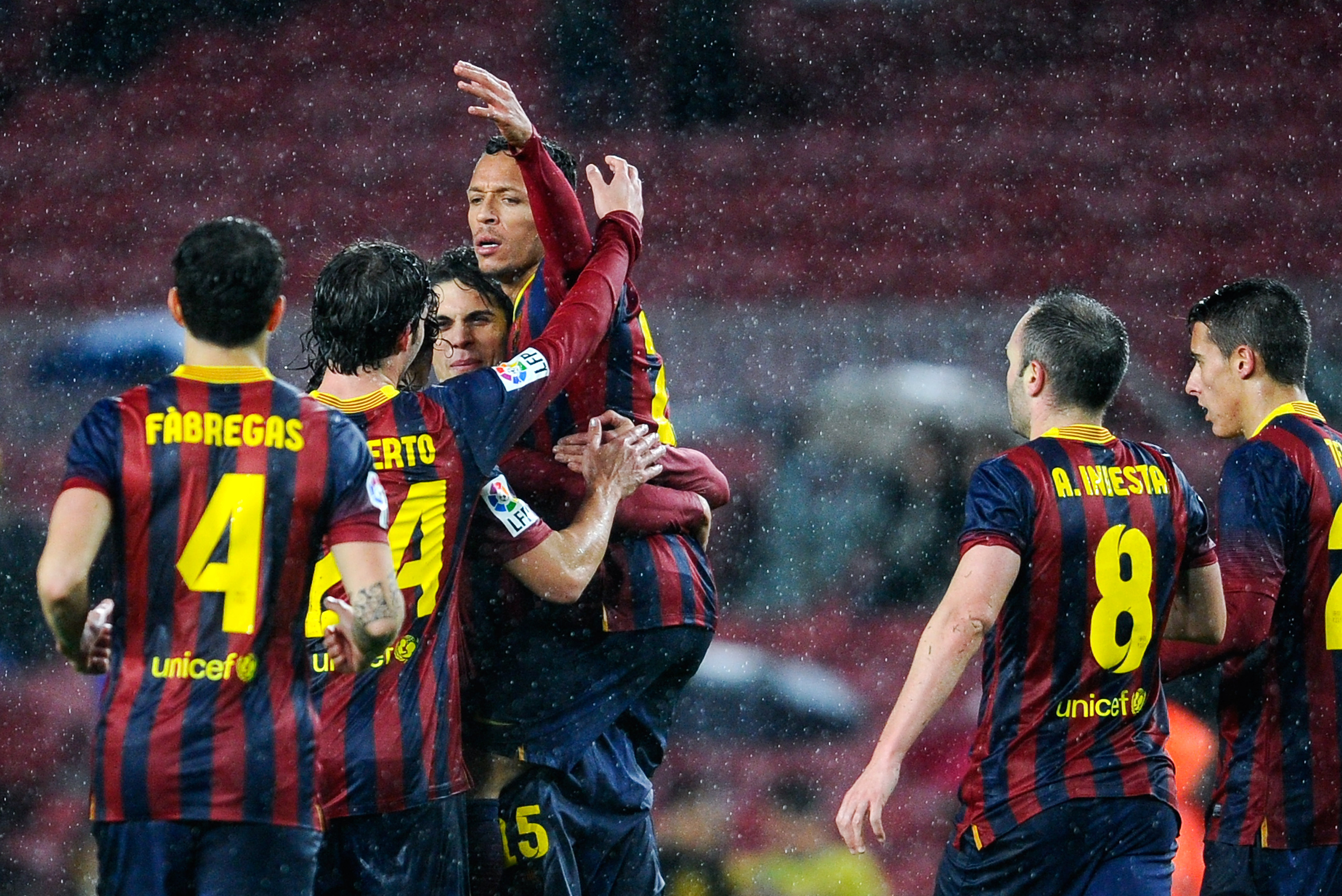 BARCELONA, SPAIN - JANUARY 29:  Adriano Correia (C) of FC Barcelona celebrates with his teammates after scoring the opening goal during the Copa del Rey Quarter Final 2nd leg match between FC Barcelona and Levante U.D Camp Nou on January 29, 2014 in Barcelona, Spain.  (Photo by David Ramos/Getty Images)