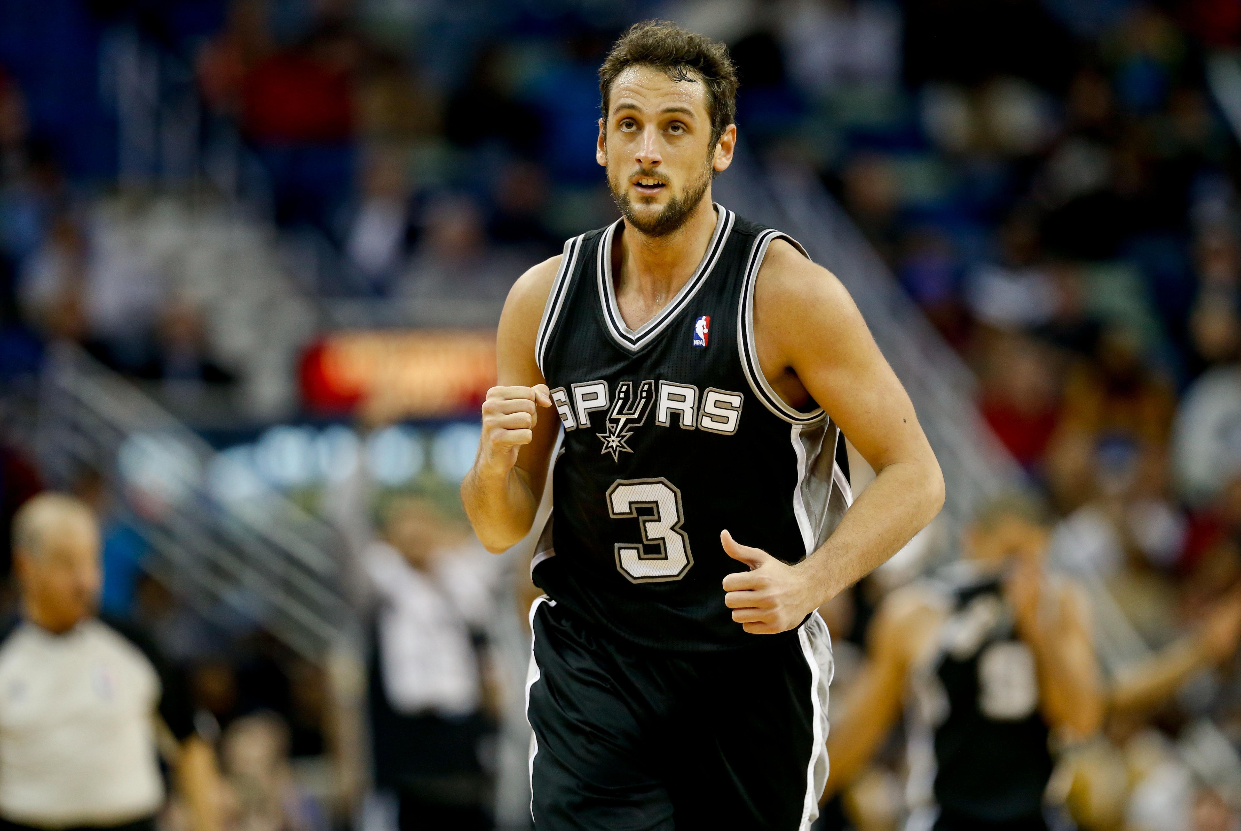 Jan 13, 2014; New Orleans, LA, USA; San Antonio Spurs shooting guard Marco Belinelli (3) reacts after a three point basket against the New Orleans Pelicans during the second half of a game at the New Orleans Arena. The Spurs defeated the Pelicans 101-95.  Mandatory Credit: Derick E. Hingle-USA TODAY Sports