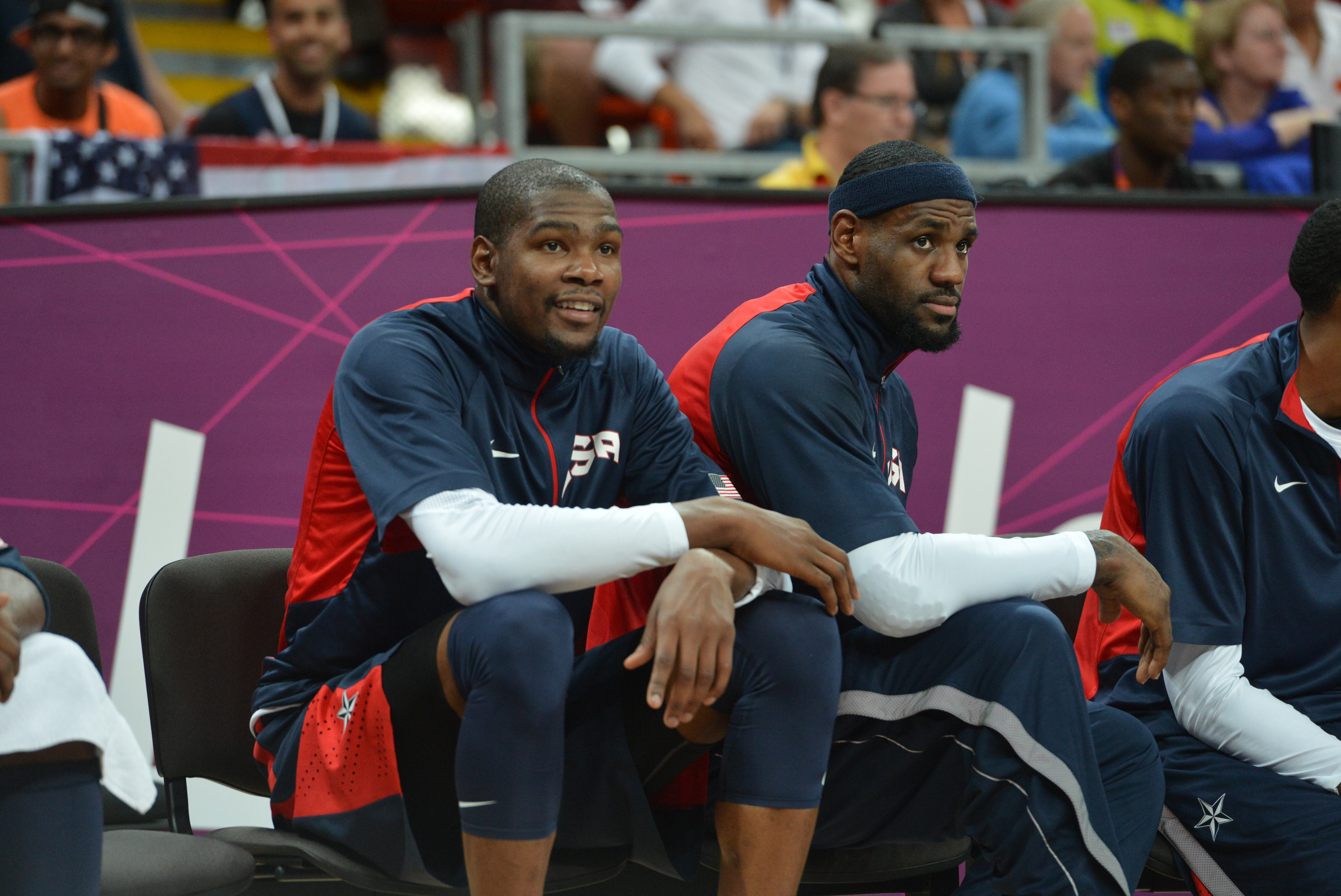 LONDON, ENGLAND - AUGUST 6: Kevin Durant #5 and LeBron James #6 of the US Men's Senior National Team watches against Argentina during their Basketball Game on Day 10 of the London 2012 Olympic Games at the Olympic Park Basketball Arena on August 6, 2012 in London, England. NOTE TO USER: User expressly acknowledges and agrees that, by downloading and/or using this Photograph, user is consenting to the terms and conditions of the Getty Images License Agreement. Mandatory Copyright Notice: Copyright 2012 NBAE (Photo by Jesse D. Garrabrant/NBAE via Getty Images)