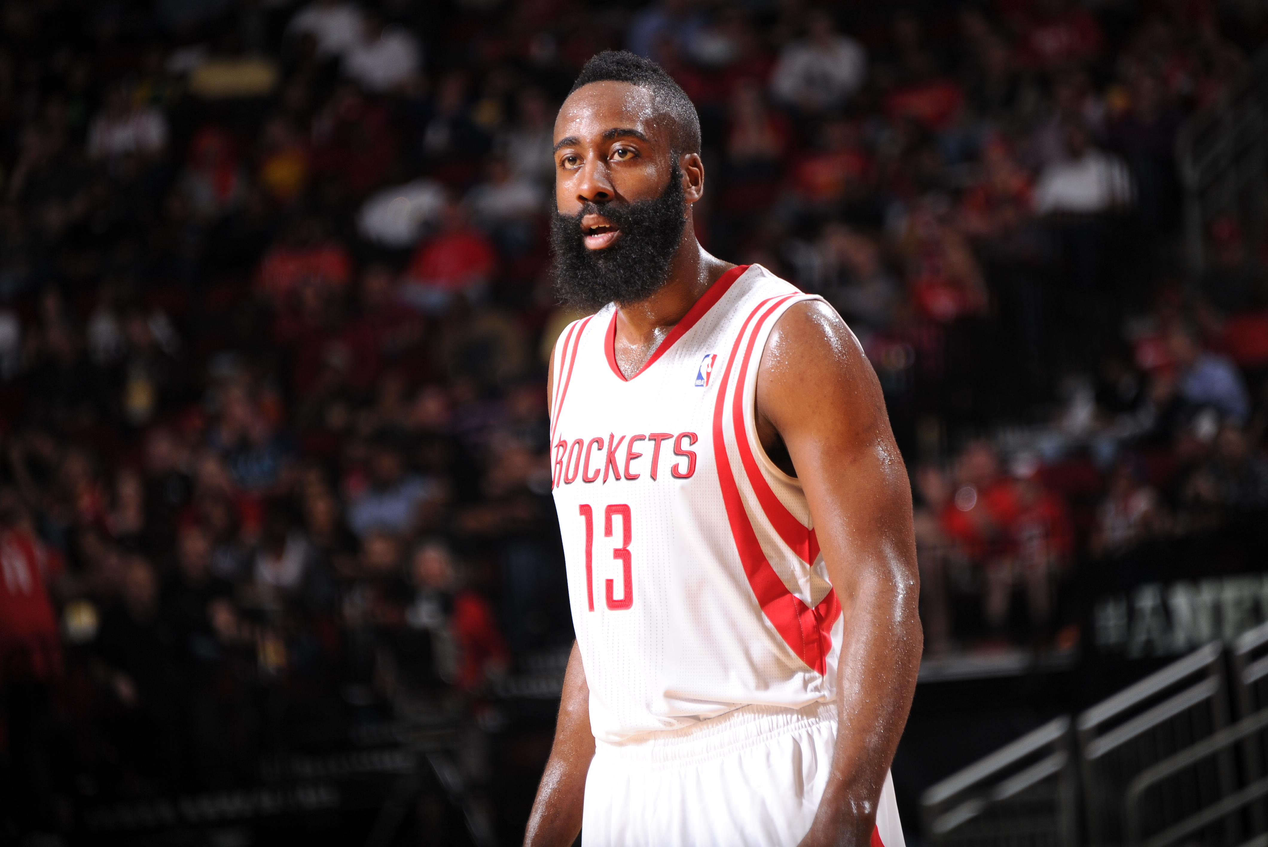 HOUSTON, TX - JANUARY 20:  James Harden #13 of the Houston Rockets reacts to a play against the Portland Trail Blazers on January 20, 2014 at the Toyota Center in Houston, Texas. NOTE TO USER: User expressly acknowledges and agrees that, by downloading and or using this photograph, User is consenting to the terms and conditions of the Getty Images License Agreement. Mandatory Copyright Notice: Copyright 2014 NBAE (Photo by Bill Baptist/NBAE via Getty Images)
