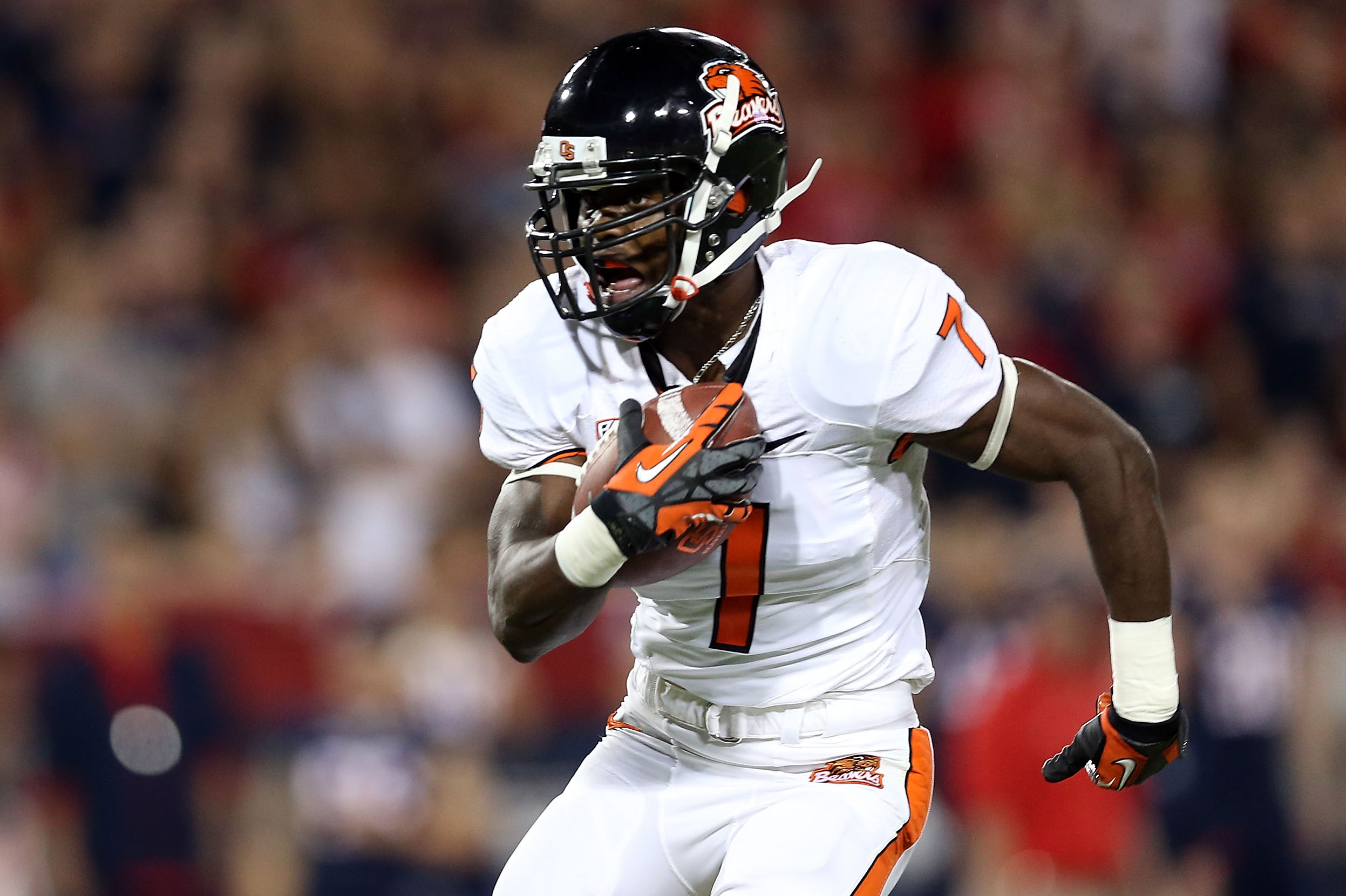TUCSON, AZ - SEPTEMBER 29:  Wide receiver Brandin Cooks #7 of the Oregon State Beavers runs with the football after a reception during the college football game against the Arizona Wildcats at Arizona Stadium on September 29, 2012 in Tucson, Arizona. The Beavers defeated the Wildcats 38-35.  (Photo by Christian Petersen/Getty Images)