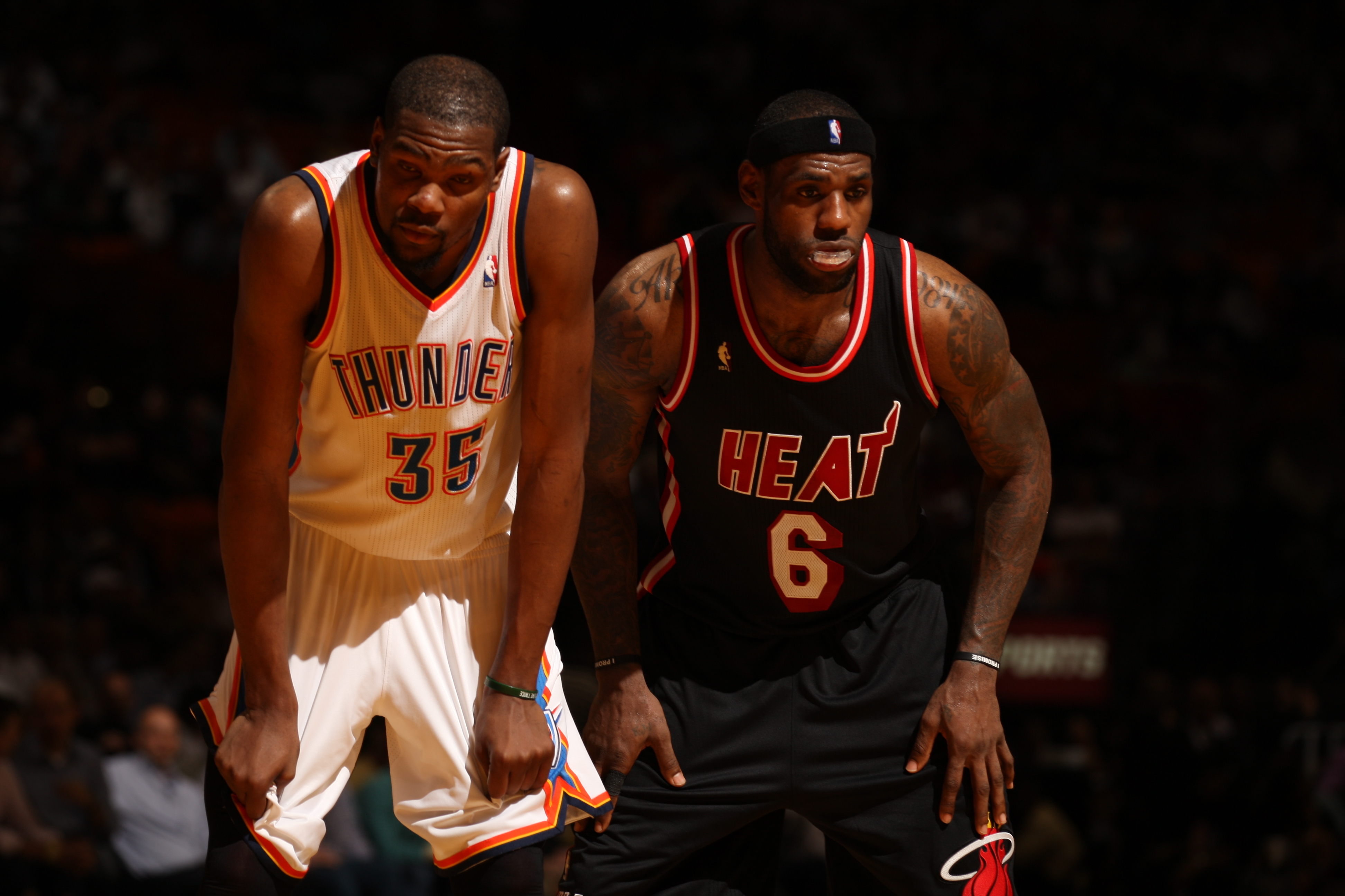 MIAMI, FL - JANUARY 29: Kevin Durant #35 of the Oklahoma City Thunder looks on against LeBron James #6 of the Miami Heat at the American Airlines Arena in Miami, Florida on Jan. 29, 2014. NOTE TO USER: User expressly acknowledges and agrees that, by downloading and/or using this photograph, user is consenting to the terms and conditions of the Getty Images License Agreement. Mandatory copyright notice: Copyright NBAE 2014 (Photo by Issac Baldizon/NBAE via Getty Images)