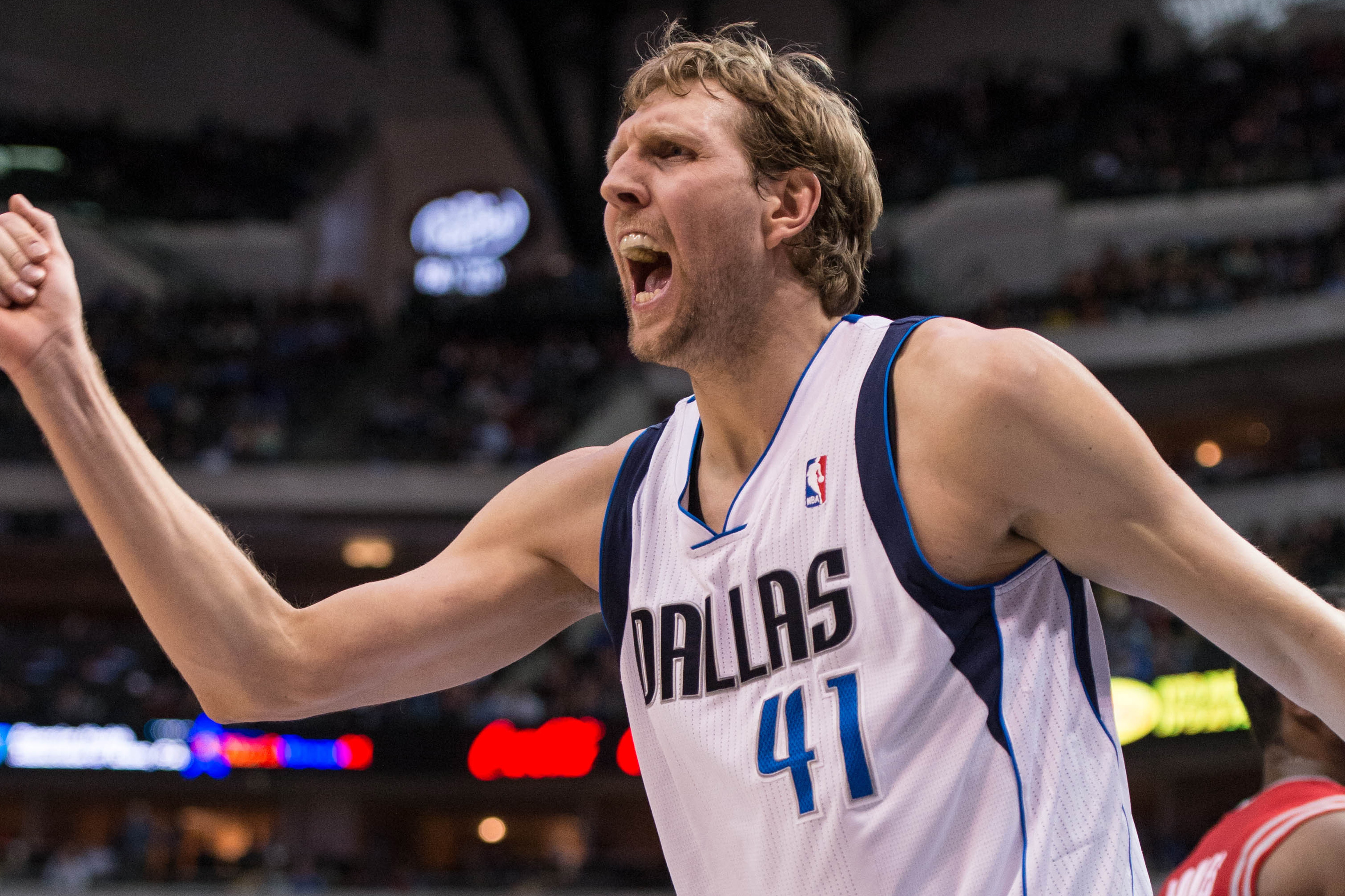 Jan 29, 2014; Dallas, TX, USA; Dallas Mavericks power forward Dirk Nowitzki (41) reacts to being fouled by Houston Rockets point guard Aaron Brooks (not pictured) during the first half at the American Airlines Center. Mandatory Credit: Jerome Miron-USA TODAY Sports