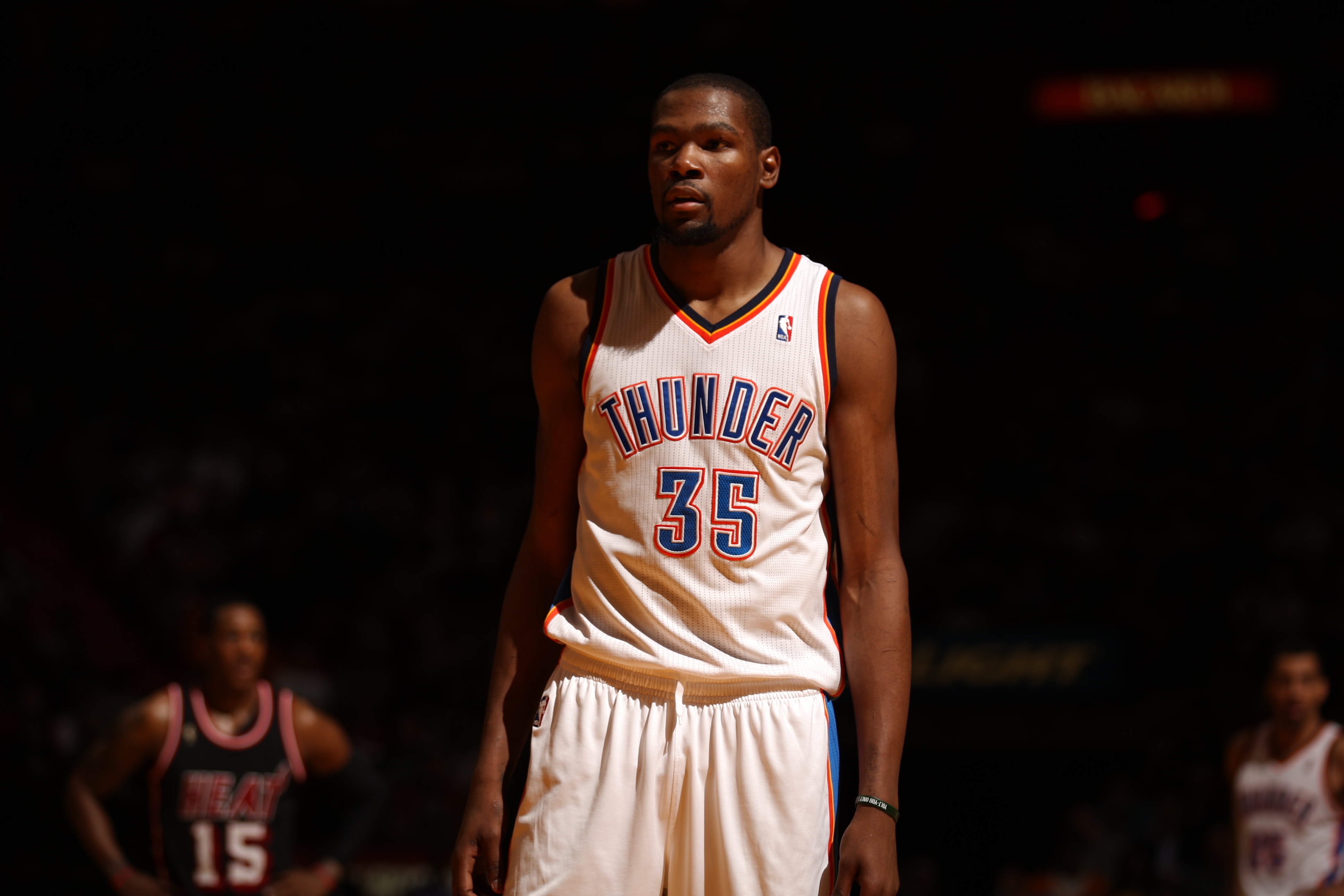 MIAMI, FL - JANUARY 29: Kevin Durant #35 of the Oklahoma City Thunder looks on against the Miami Heat at the American Airlines Arena in Miami, Florida on Jan. 29, 2014. NOTE TO USER: User expressly acknowledges and agrees that, by downloading and/or using this photograph, user is consenting to the terms and conditions of the Getty Images License Agreement. Mandatory copyright notice: Copyright NBAE 2014 (Photo by Issac Baldizon/NBAE via Getty Images)
