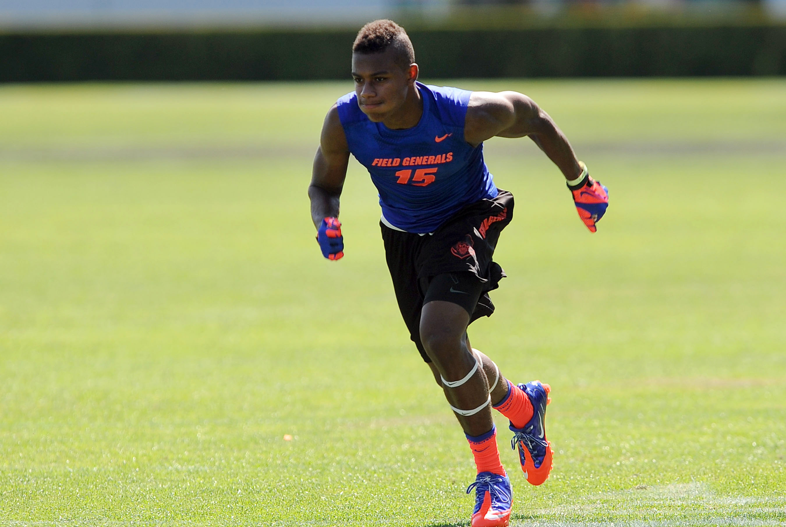 Jul 2, 2013; Beaverton, OR, USA; Wide receiver Malachi Dupre (15) runs a pass route during the Nike 7on7 pool play at Nike World Headquarters in Beaverton, Oregon on Tuesday July, 2, 2013. Mandatory Credit: Steve Dykes-USA TODAY Sports
