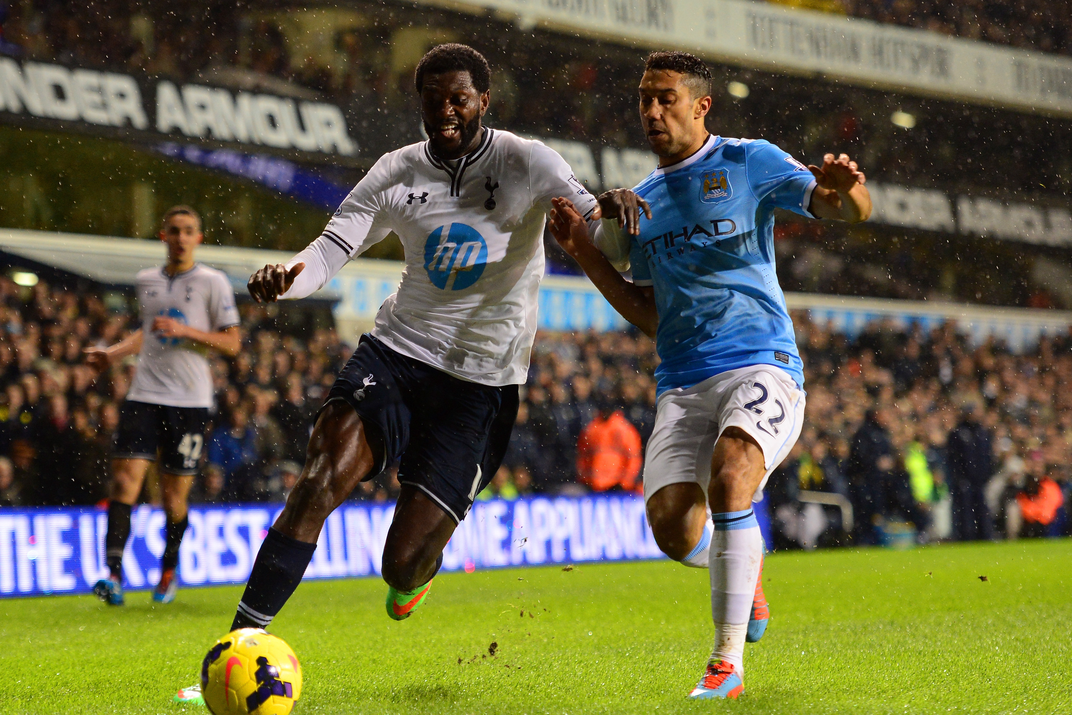 LONDON, ENGLAND - JANUARY 29:  Emmanuel Adebayor of Tottenham Hotspur and Gael Clichy of Manchester City battle for the ball during the Barclays Premier League match between Tottenham Hotspur and Manchester City at White Hart Lane on January 29, 2014 in London, England.  (Photo by Jamie McDonald/Getty Images)