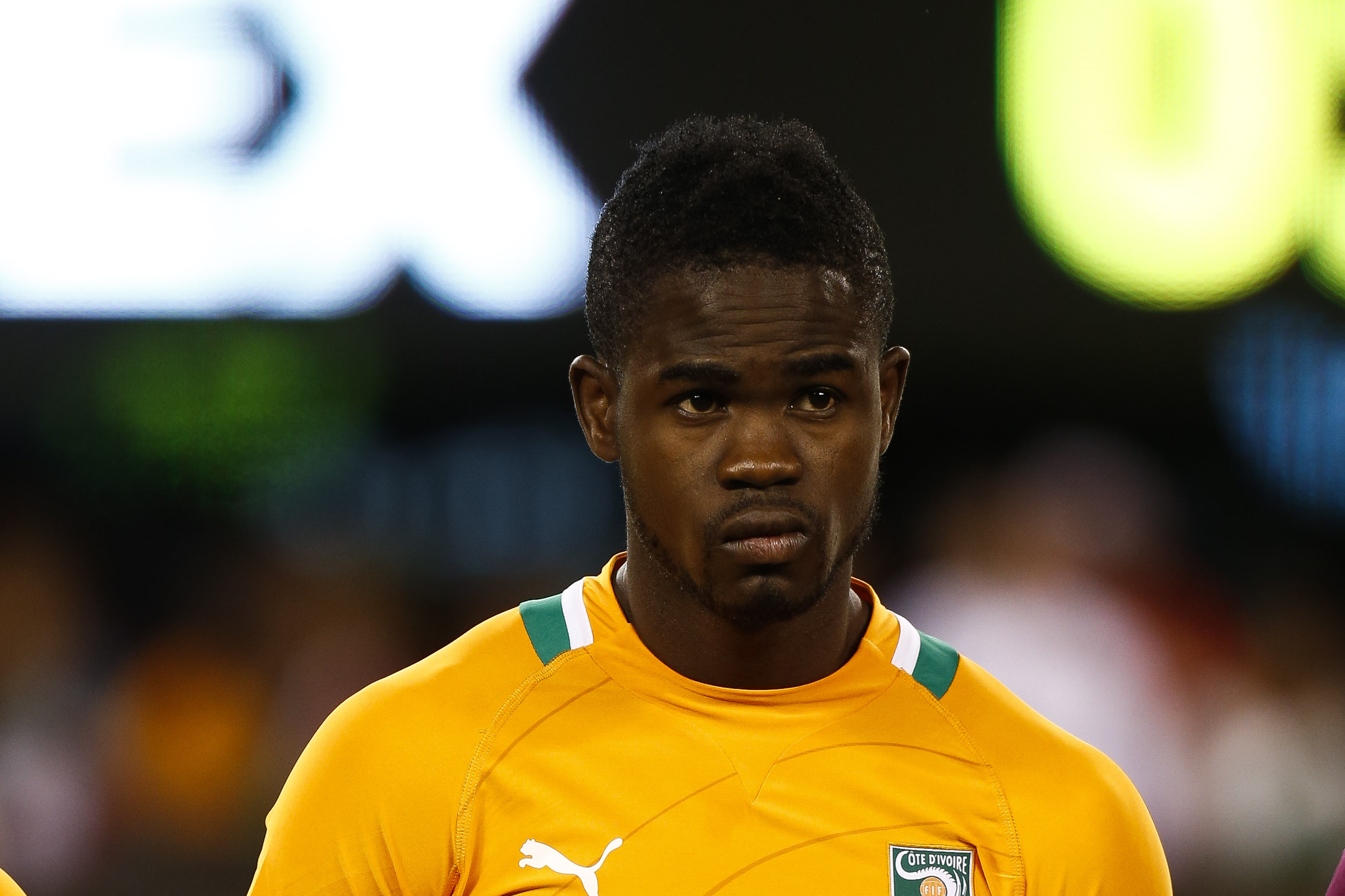 EAST RUTHERFORD, NJ - AUGUST 14:  Abdul Razak #20 of Ivory Coast stands for the anthem before their match against Mexico at MetLife Stadium on August 14, 2013 in East Rutherford, New Jersey.  (Photo by Jeff Zelevansky/Getty Images)