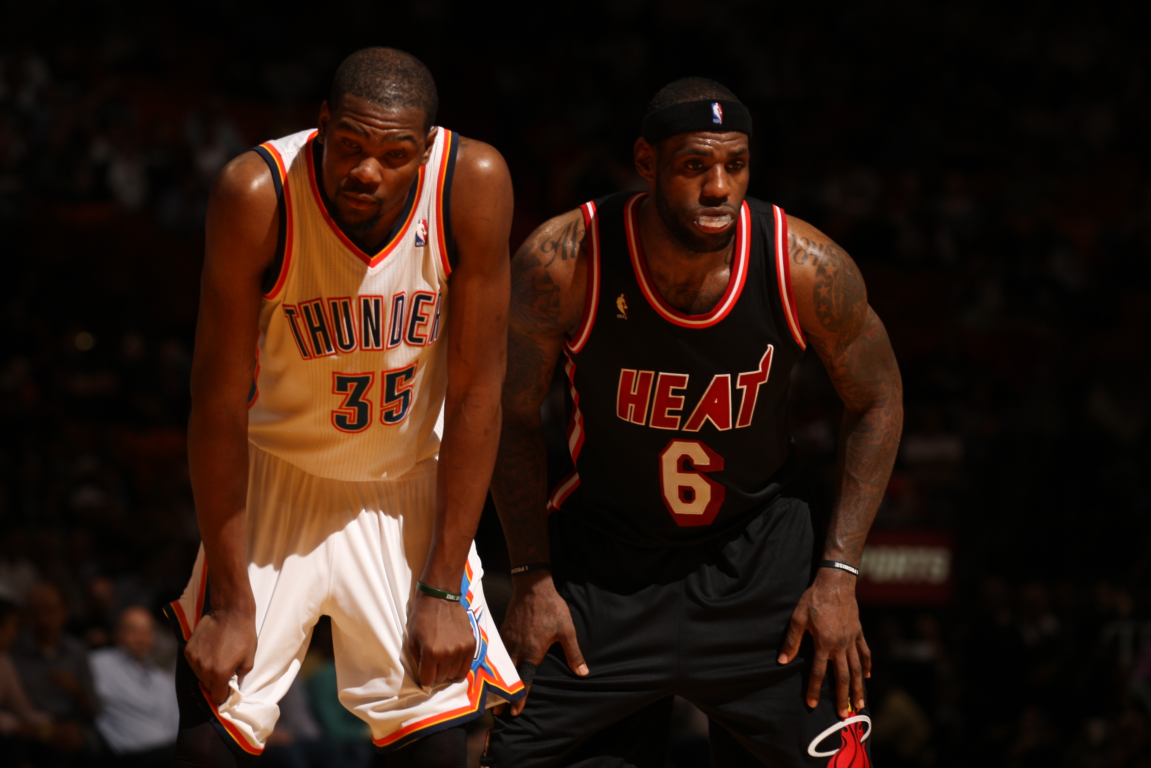 MIAMI, FL - JANUARY 29: Kevin Durant #35 of the Oklahoma City Thunder looks on against LeBron James #6 of the Miami Heat at the American Airlines Arena in Miami, Florida on Jan. 29, 2014. NOTE TO USER: User expressly acknowledges and agrees that, by downloading and/or using this photograph, user is consenting to the terms and conditions of the Getty Images License Agreement. Mandatory copyright notice: Copyright NBAE 2014 (Photo by Issac Baldizon/NBAE via Getty Images)