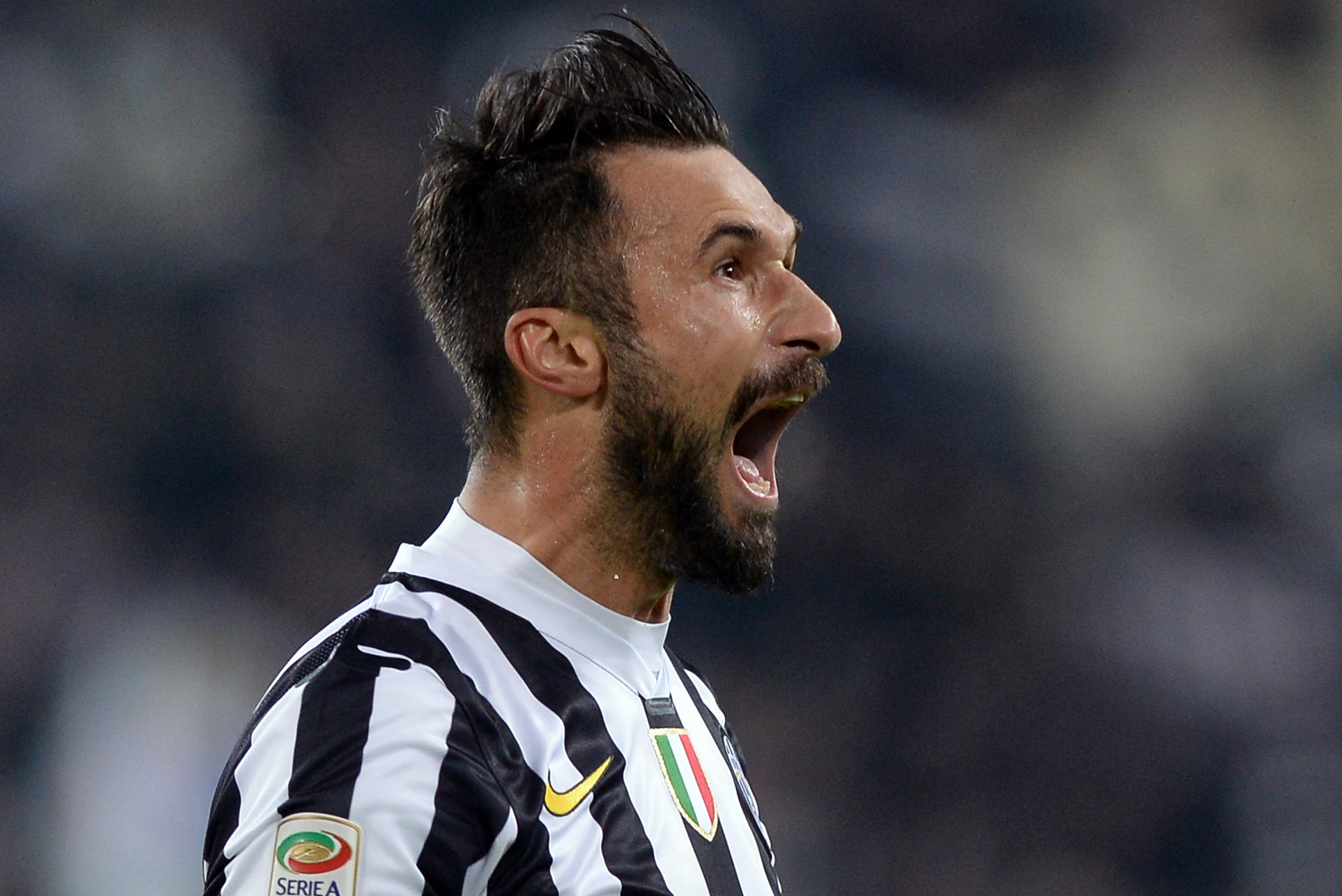 TURIN, ITALY - JANUARY 05:  Mirko Vucinic of FC Juventus celebrates scoring the third goal during the Serie A match between Juventus and AS Roma at Juventus Arena on January 5, 2014 in Turin, Italy.  (Photo by Claudio Villa/Getty Images)