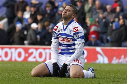 Queens Park Rangers' Adel Taarabt reacts to his missed chance to score against Reading during their English Premier League soccer match at Loftus Road stadium, London, Sunday, Nov. 4, 2012. (AP Photo/Sang Tan)