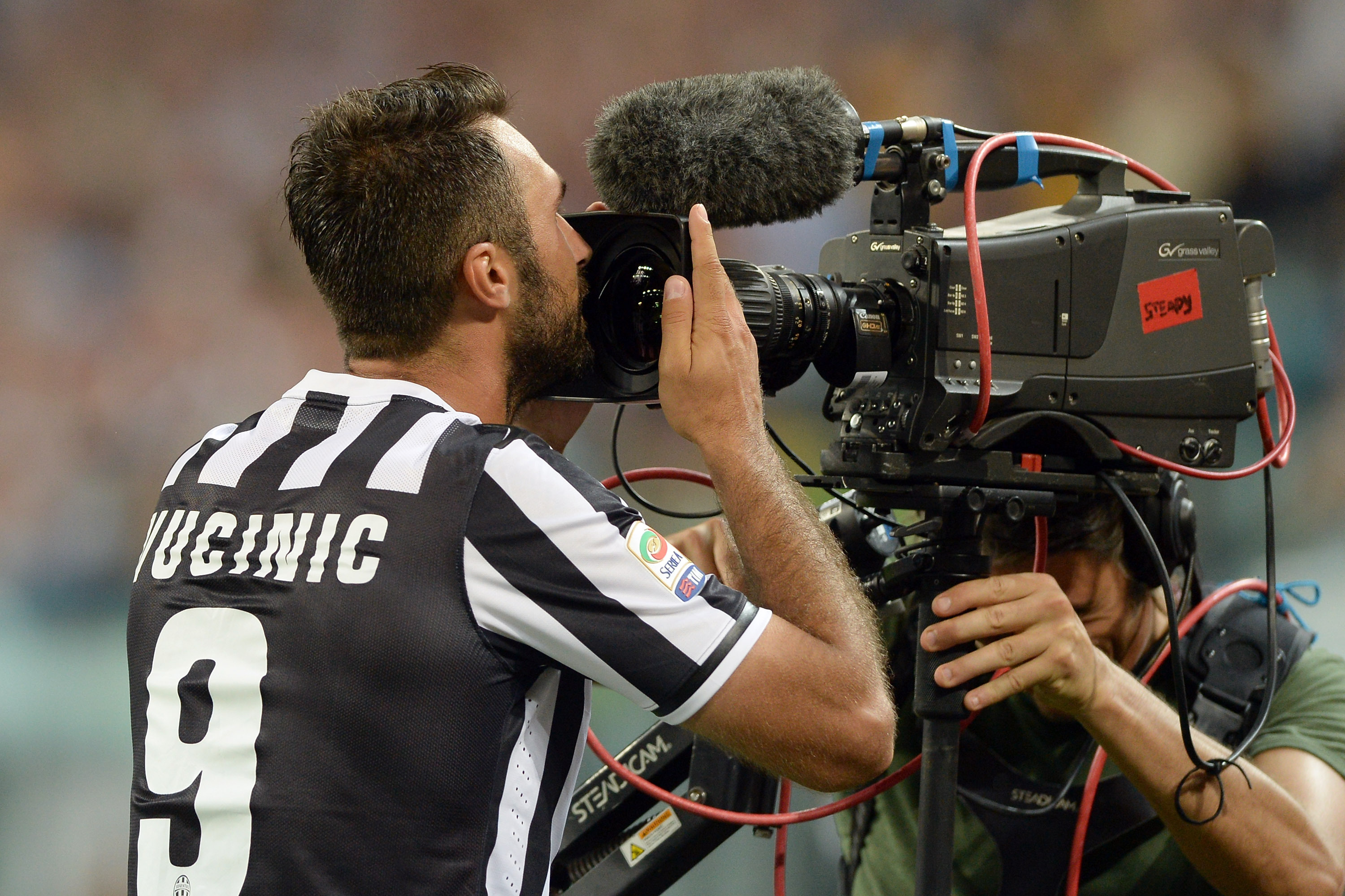 TURIN, ITALY - AUGUST 31:  Mirko Vucinic of FC Juventus celebrates scoring the third goal during the Serie A match between Juventus and SS Lazio at Juventus Arena on August 31, 2013 in Turin, Italy.  (Photo by Claudio Villa/Getty Images)