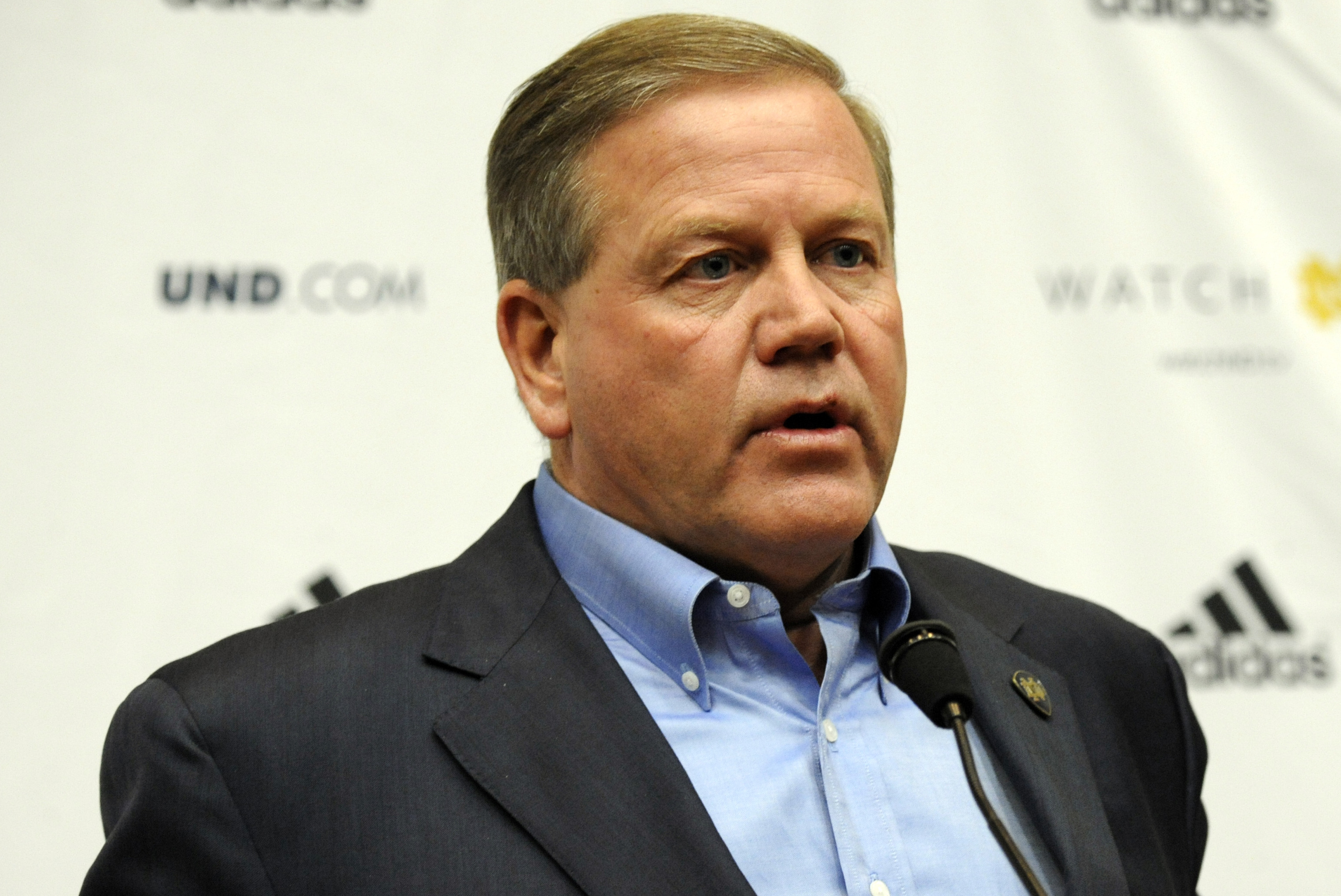 Notre Dame head football coach Brian Kelly introduces Brian Van Gorder during a press conference introducing the new defensive coordinator Tuesday Jan. 14, 2013 in South Bend, Ind. (AP Photo/Joe Raymond)
