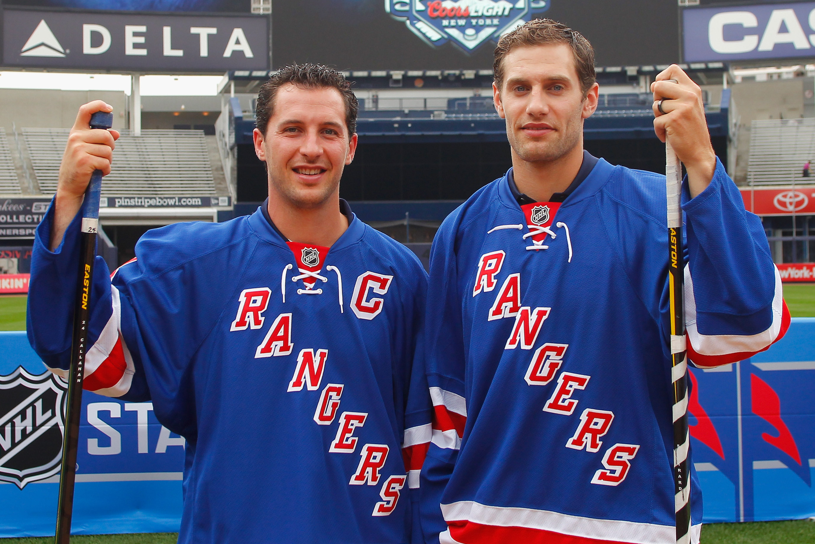 NEW YORK, NY - AUGUST 08: New York Rangers players Ryan Callahan (L) and Dan Girardi pose for a photo during the 2014 NHL Stadium Series Media Availabilty at Yankee Stadium on August 8, 2013 in New York City. (Photo by Andy Marlin/Getty Images)