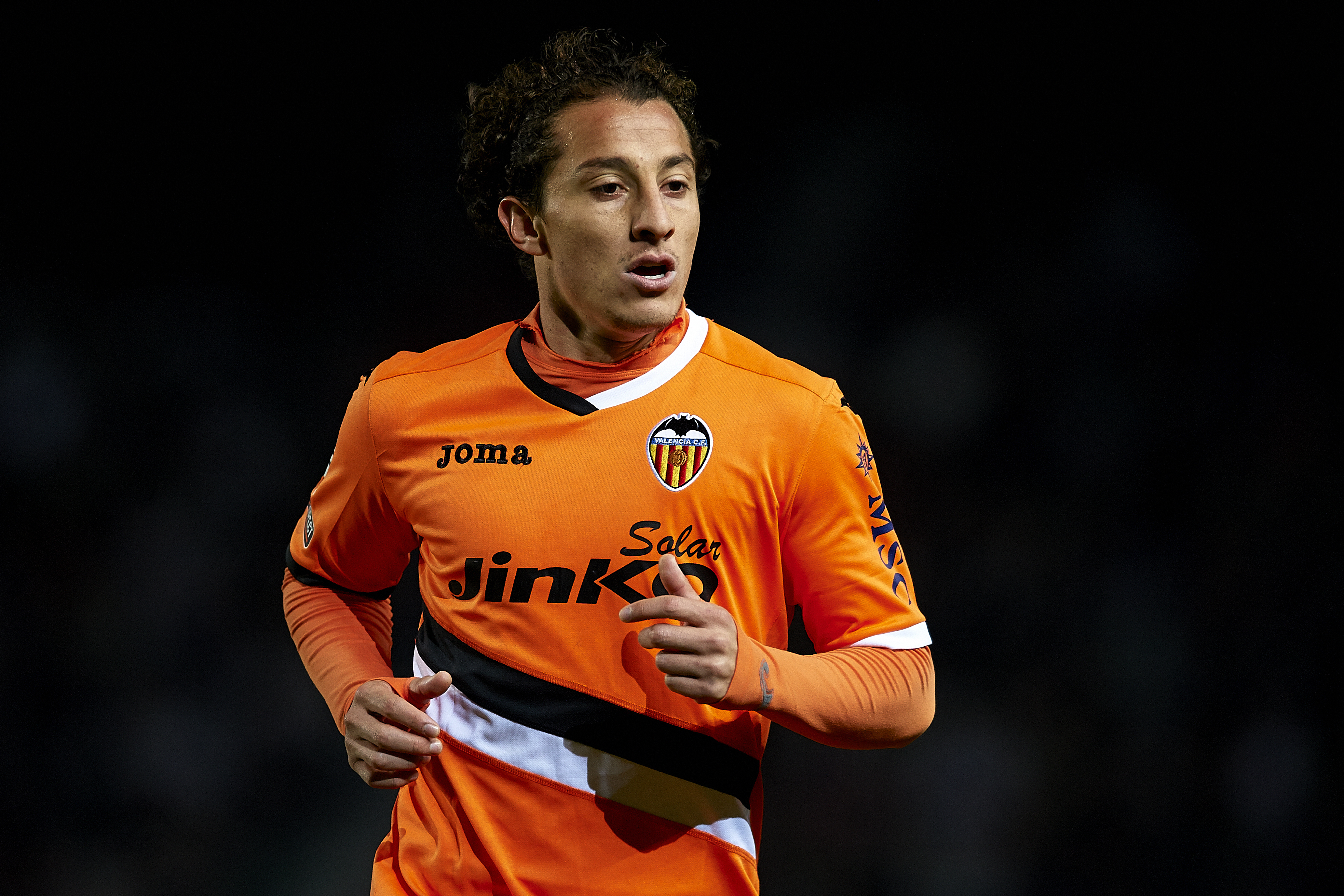 ELCHE, SPAIN - NOVEMBER 24:  Andres Guardado of Valencia looks on during the La Liga match between Elche FC and Valencia CF at Manuel Martinez Valero on November 24, 2013 in Valencia, Spain.  (Photo by Manuel Queimadelos Alonso/Getty Images)
