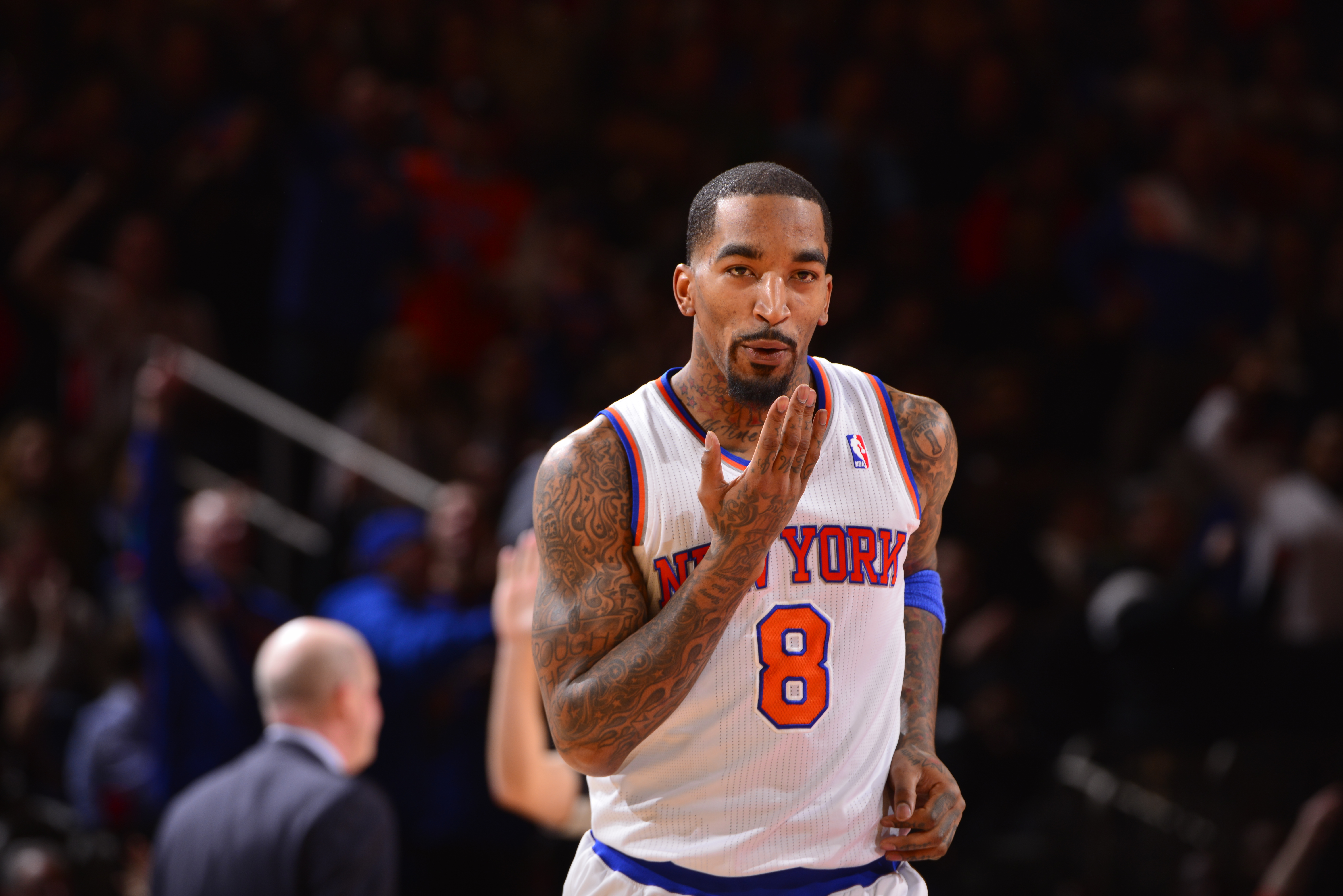 NEW YORK - JANUARY 24: J.R. Smith #8 of the New York Knicks celebrates during the game against the Charlotte Bobcats on January 24, 2014 at Madison Square Garden in New York City. NOTE TO USER: User expressly acknowledges and agrees that, by downloading and or using this photograph, User is consenting to the terms and conditions of the Getty Images License Agreement. Mandatory Copyright Notice: Copyright 2014 NBAE  (Photo by David Dow NBAE via Getty Images)
