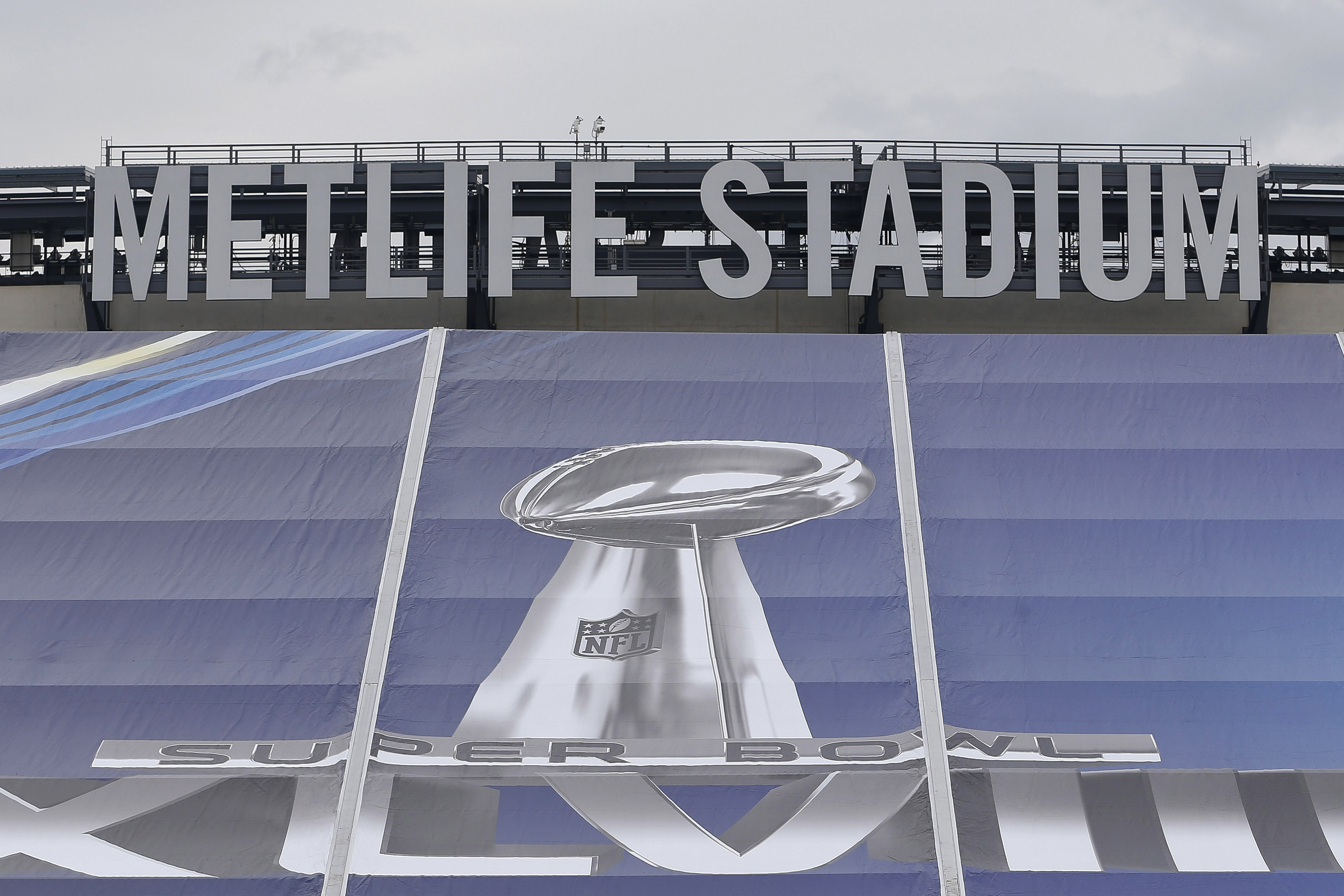 EAST RUTHERFORD, NJ - JANUARY 27:   Super Bowl signs are seen at MetLife Stadium as the venue is prepared to host Super Bowl XLVIII between the Denver Broncos and the Seattle Seahawks January 27, 2014 in East Rutherford, New Jersey.  (Photo by Jeff Zelevansky/Getty Images)