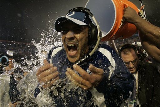 Indianapolis Colts coach Tony Dungy is dunked after the Colts defeated the Chicago Bears 29-17 in the Super Bowl XLI football game at Dolphin Stadium in Miami, Sunday, Feb. 4, 2007. (AP Photo/David J. Phillip)