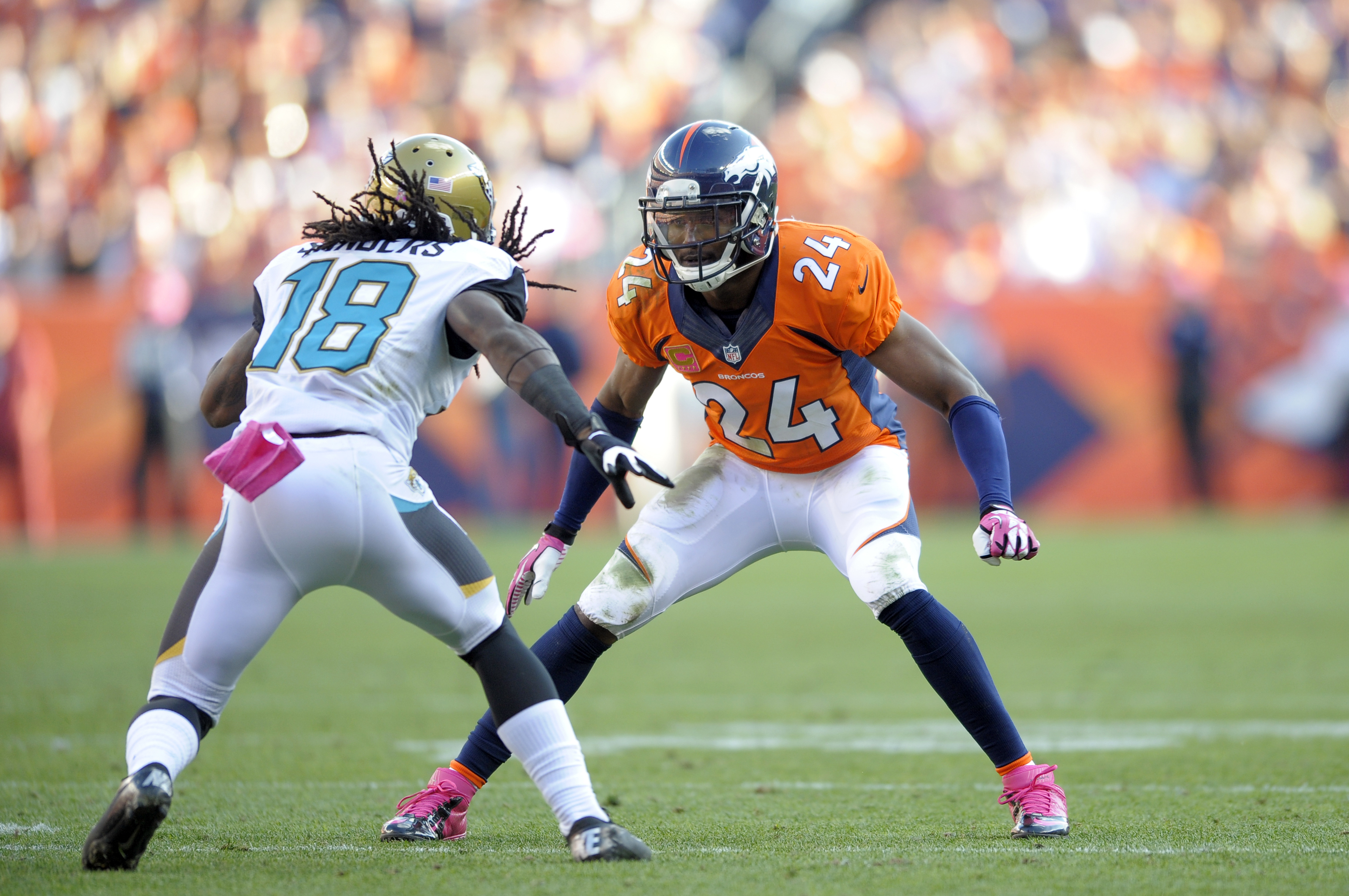 Denver Broncos cornerback Champ Bailey (24) covers Jacksonville Jaguars wide receiver Ace Sanders (18) during an NFL football game, Sunday, Oct. 13, 2013, in Denver. (AP Photo/Jack Dempsey)