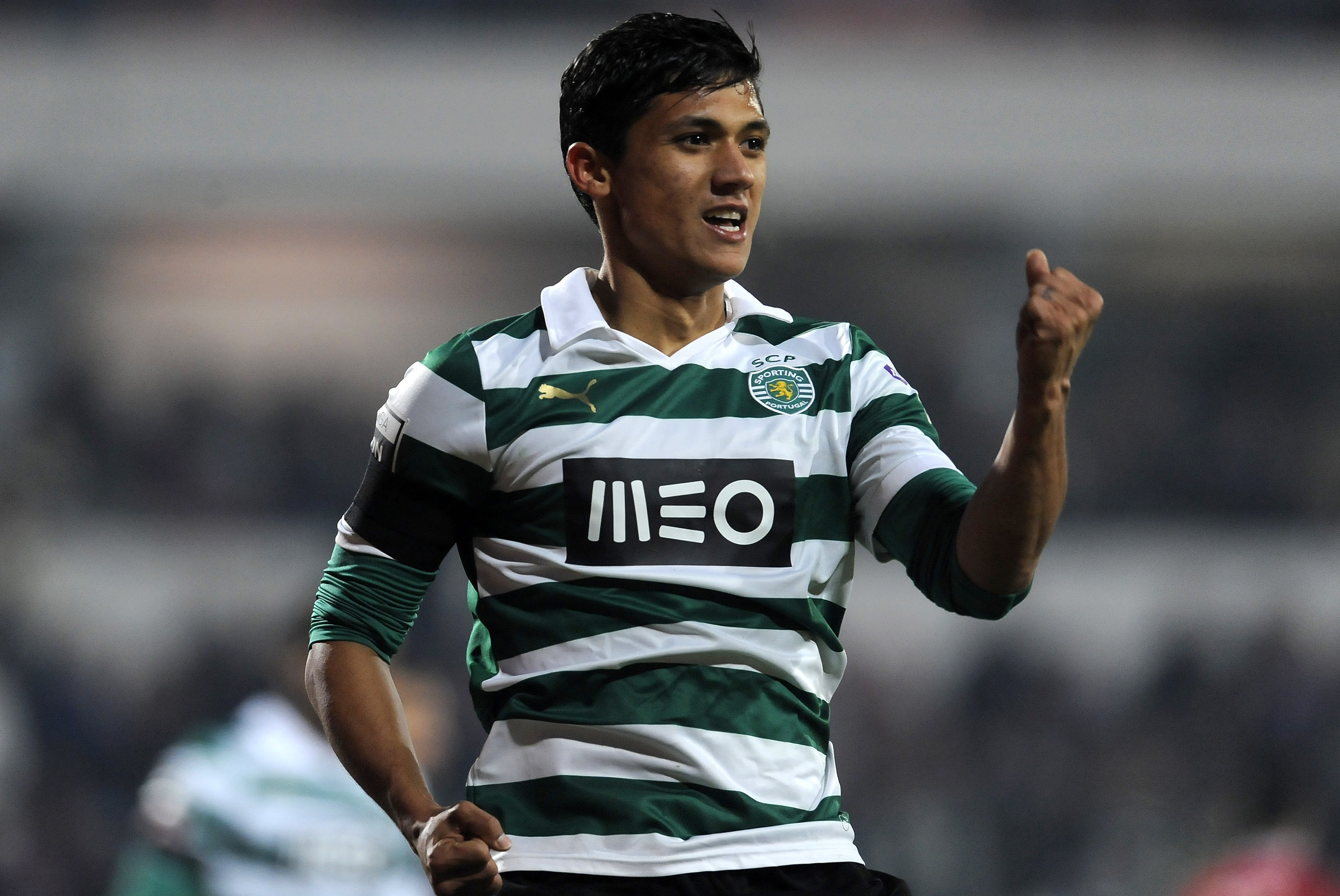 Sporting Lisbon's Fredy Montero, from Colombia, celebrates after scoring his second goal against Gil Vicente in a Portuguese League soccer match at the Cidade de Barcelos stadium, Barcelos, northern Portugal, Sunday, Dec. 8, 2013. (AP Photo/Paulo Duarte)