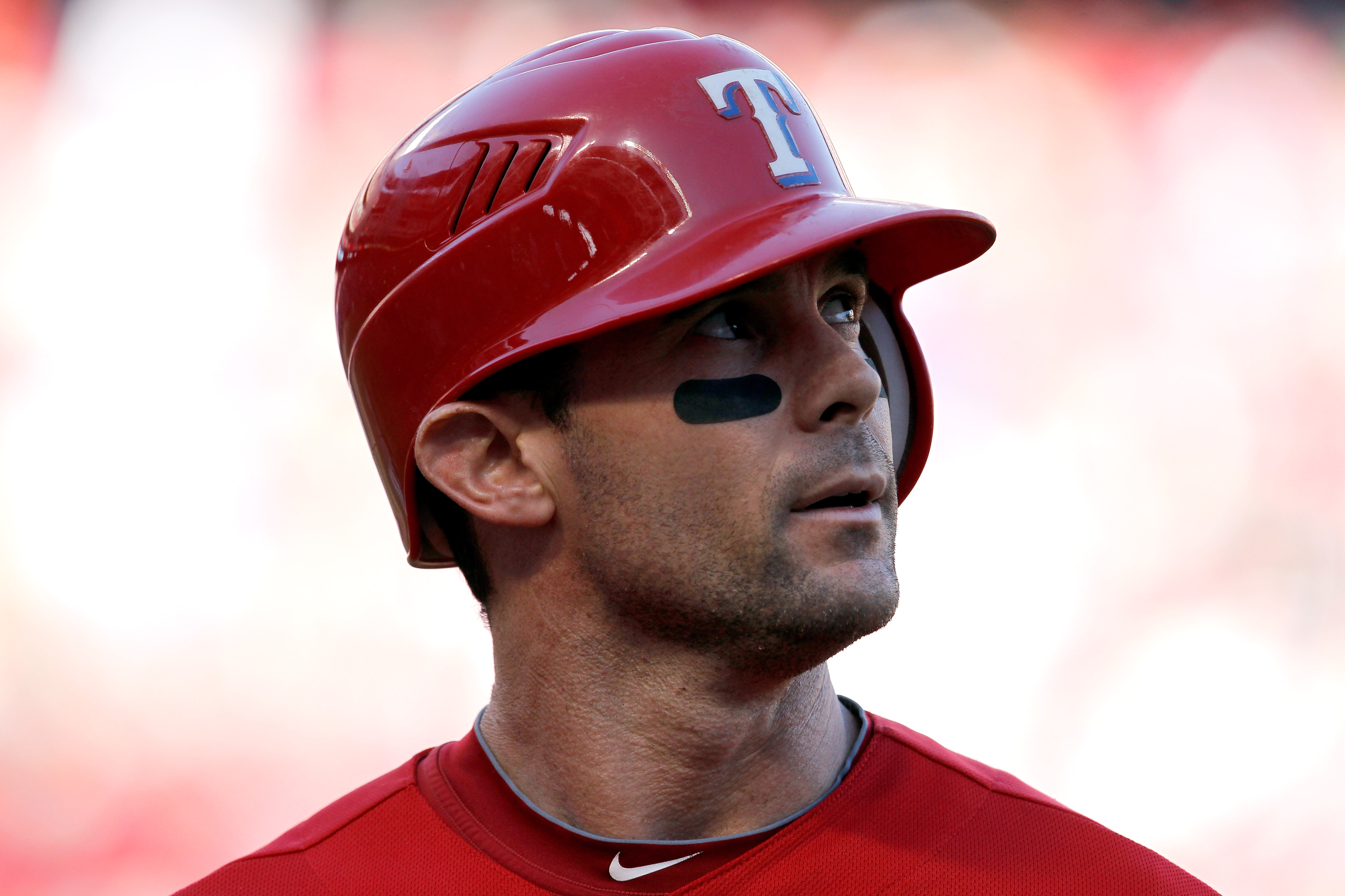 ARLINGTON, TX - SEPTEMBER 30:  Michael Young #10 of the Texas Rangers reacts after flying out to centerfield in the fourth inning while taking on the Tampa Bay Rays during Game One of the American League Division Series at Rangers Ballpark in Arlington on September 30, 2011 in Arlington, Texas.  (Photo by Tom Pennington/Getty Images)