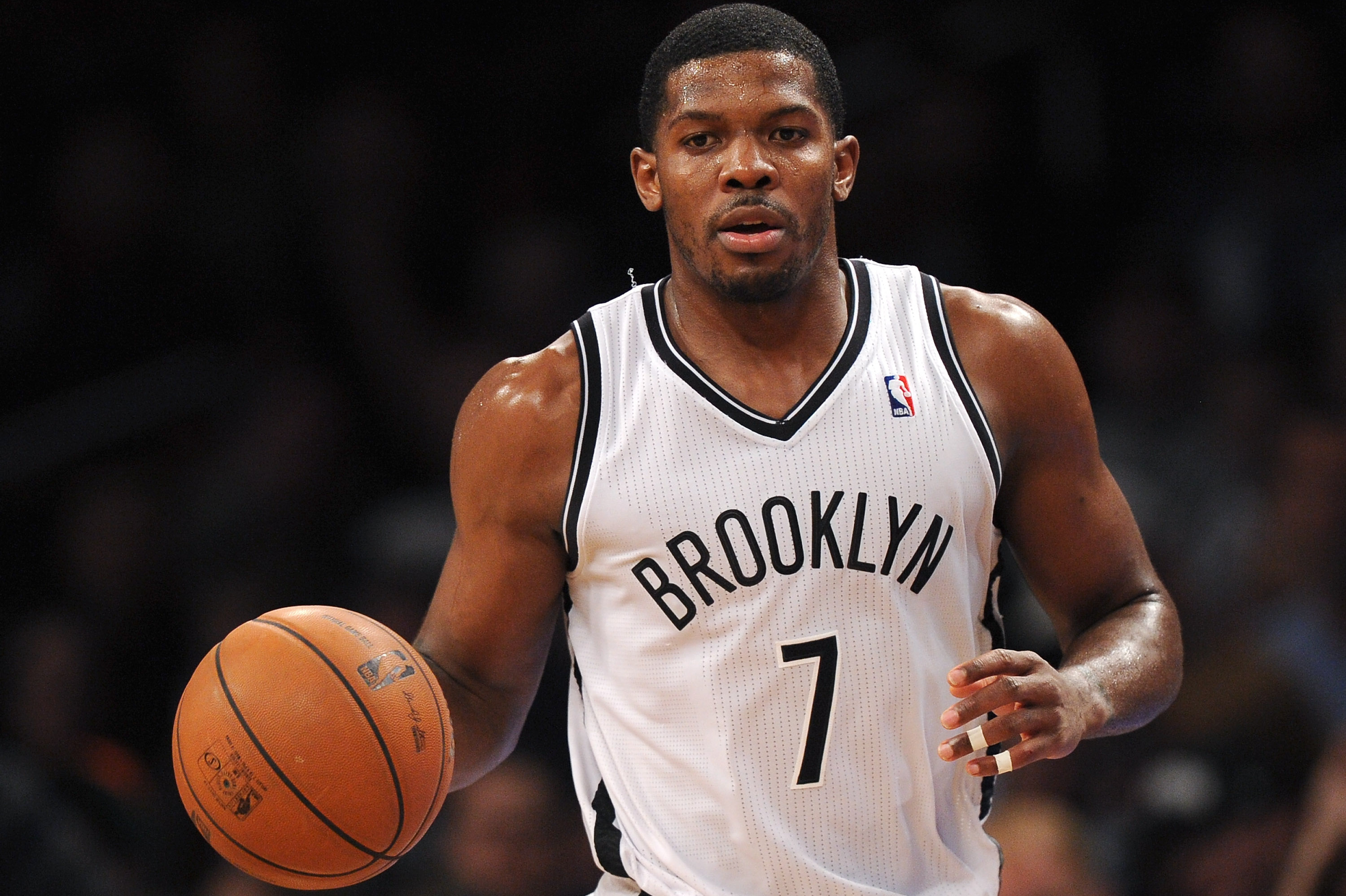 NEW YORK, NY - DECEMBER 03:  Joe Johnson #7 of the Brooklyn Nets dribbles against the Denver Nuggets during the second half at Barclays Center on December 3, 2013 in the Brooklyn borough of New York City. The Nuggets defeat the Nets 111-87. NOTE TO USER: User expressly acknowledges and agrees that, by downloading and/or using this photograph, user is consenting to the terms and conditions of the Getty Images License Agreement. (Photo by Maddie Meyer/Getty Images)