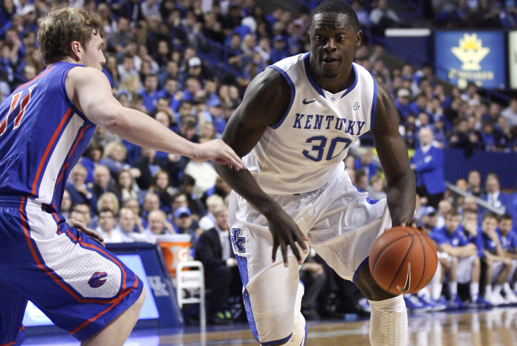 Dec 10, 2013; Lexington, KY, USA; Kentucky Wildcats forward Julius Randle (30) dribbles the ball against Boise State Broncos guard Jeff Elorriaga (11) in the first half at Rupp Arena. Mandatory Credit: Mark Zerof-USA TODAY Sports