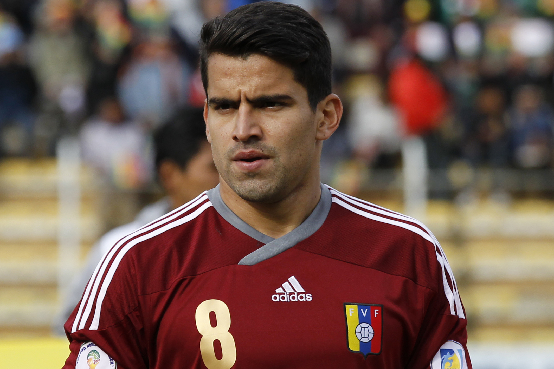 Venezuela's Tomas Rincon poses for photographers before the game against Bolivia for a 2014 World Cup qualifying soccer match  in La Paz, Bolivia, Friday, June 7, 2013.  (AP Photo/Dolores Ochoa)