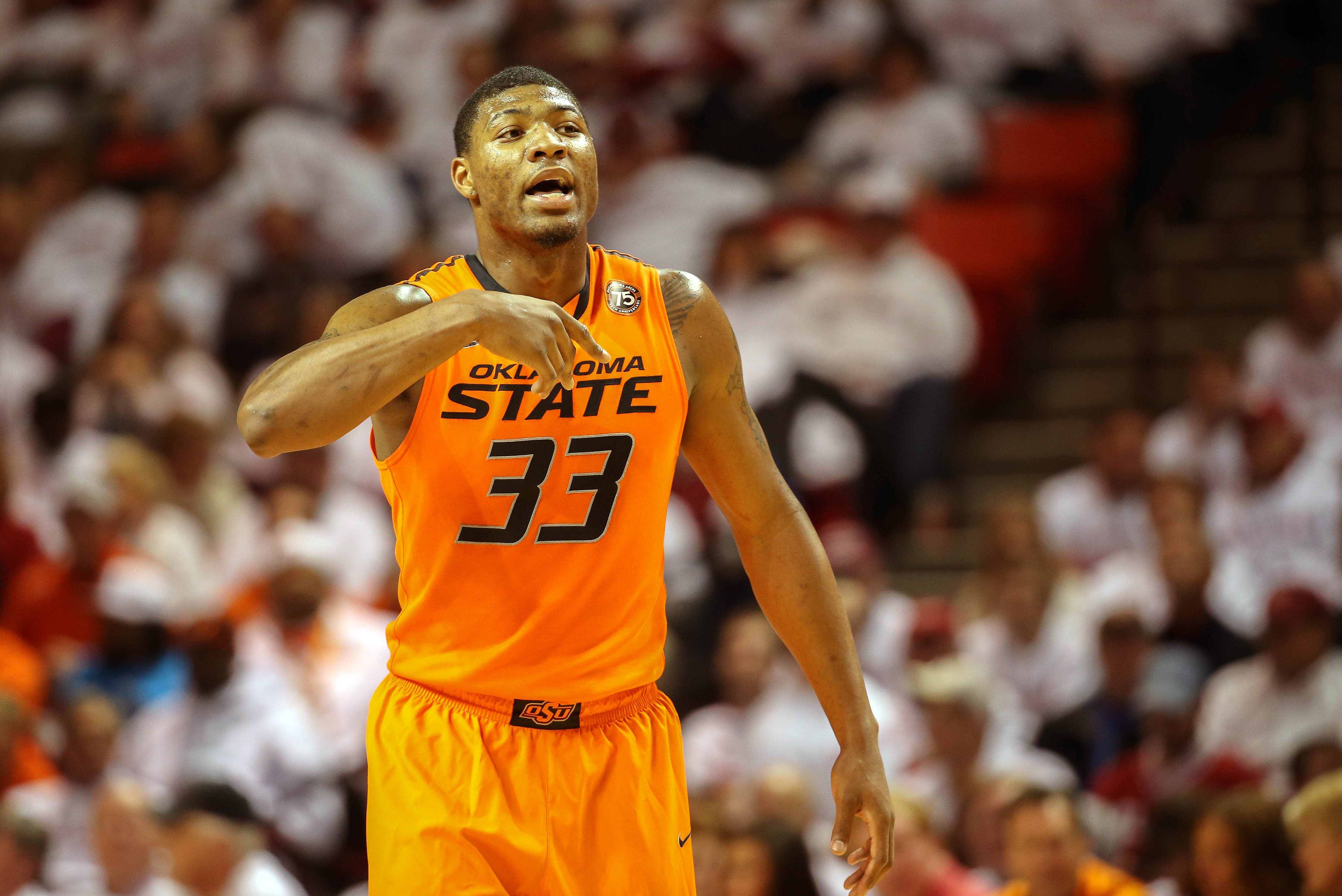 Jan 27, 2014; Norman, OK, USA; Oklahoma State Cowboys guard Marcus Smart (33) reacts during the game against the Oklahoma Sooners at Lloyd Noble Center. Oklahoma won 88-76. Mandatory Credit: Kevin Jairaj-USA TODAY Sports