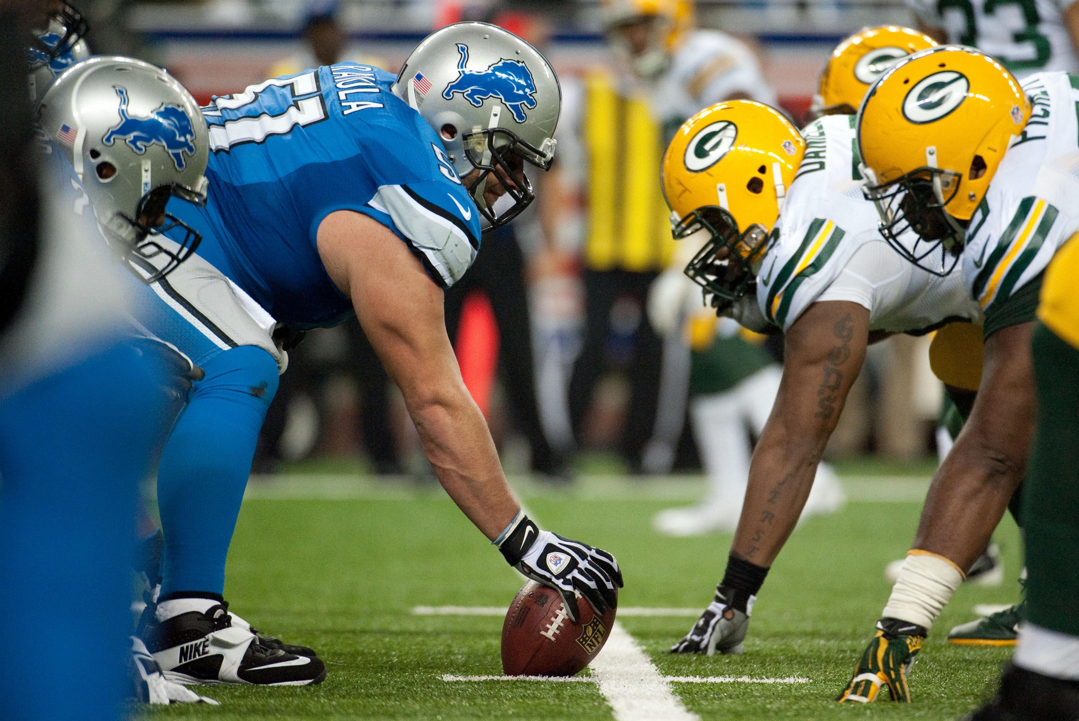 Nov 28, 2013; Detroit, MI, USA; Detroit Lions offensive line lines up against Green Bay Packers defensive line during the fourth quarter during a NFL football game on Thanksgiving at Ford Field. Detroit won 40-10. Mandatory Credit: Tim Fuller-USA TODAY Sports