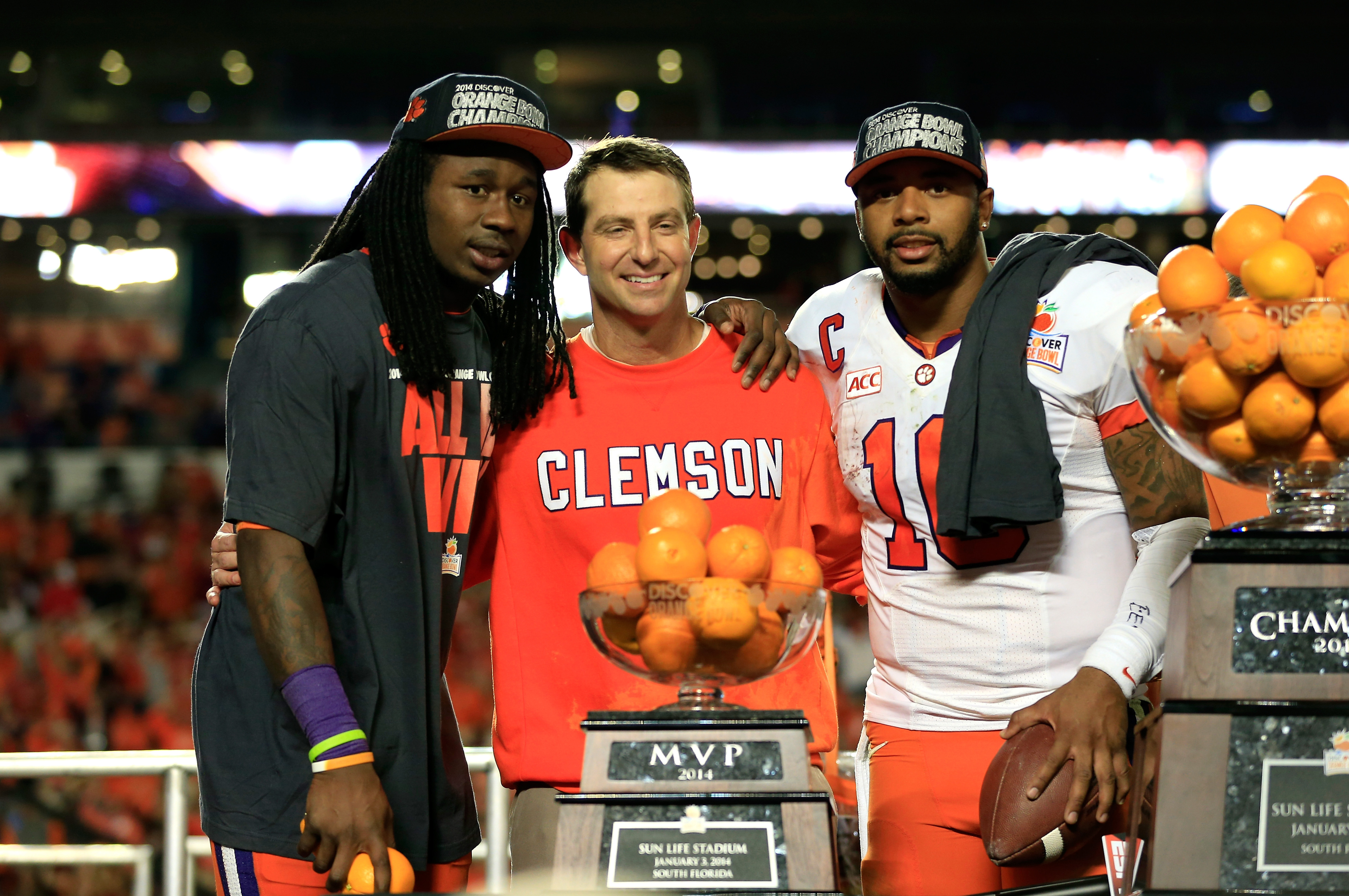 MIAMI GARDENS, FL - JANUARY 03:  (L-R) Sammy Watkins #2, head coach Dabo Swinney and Tajh Boyd #10 of the Clemson Tigers celebrate after defeating the Ohio State Buckeyes during the Discover Orange Bowl at Sun Life Stadium on January 3, 2014 in Miami Gardens, Florida. Clemson defeated Ohio State 40-35.  (Photo by Chris Trotman/Getty Images)