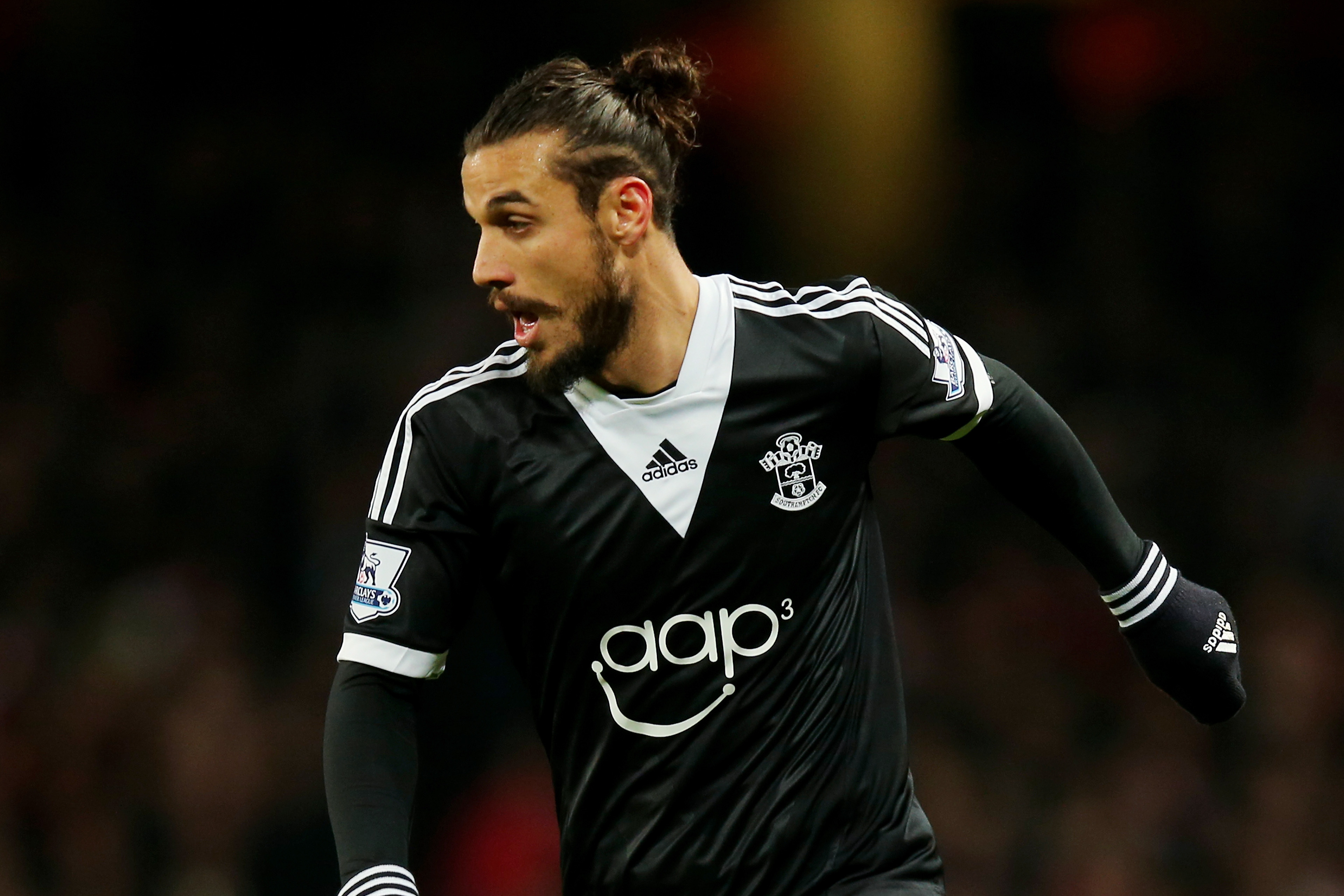 LONDON, ENGLAND - NOVEMBER 23: Daniel Osvaldo of Southampton runs with the ball during the Barclays Premier League match between Arsenal and Southampton at Emirates Stadium on November 23, 2013 in London, England.  (Photo by Clive Rose/Getty Images)