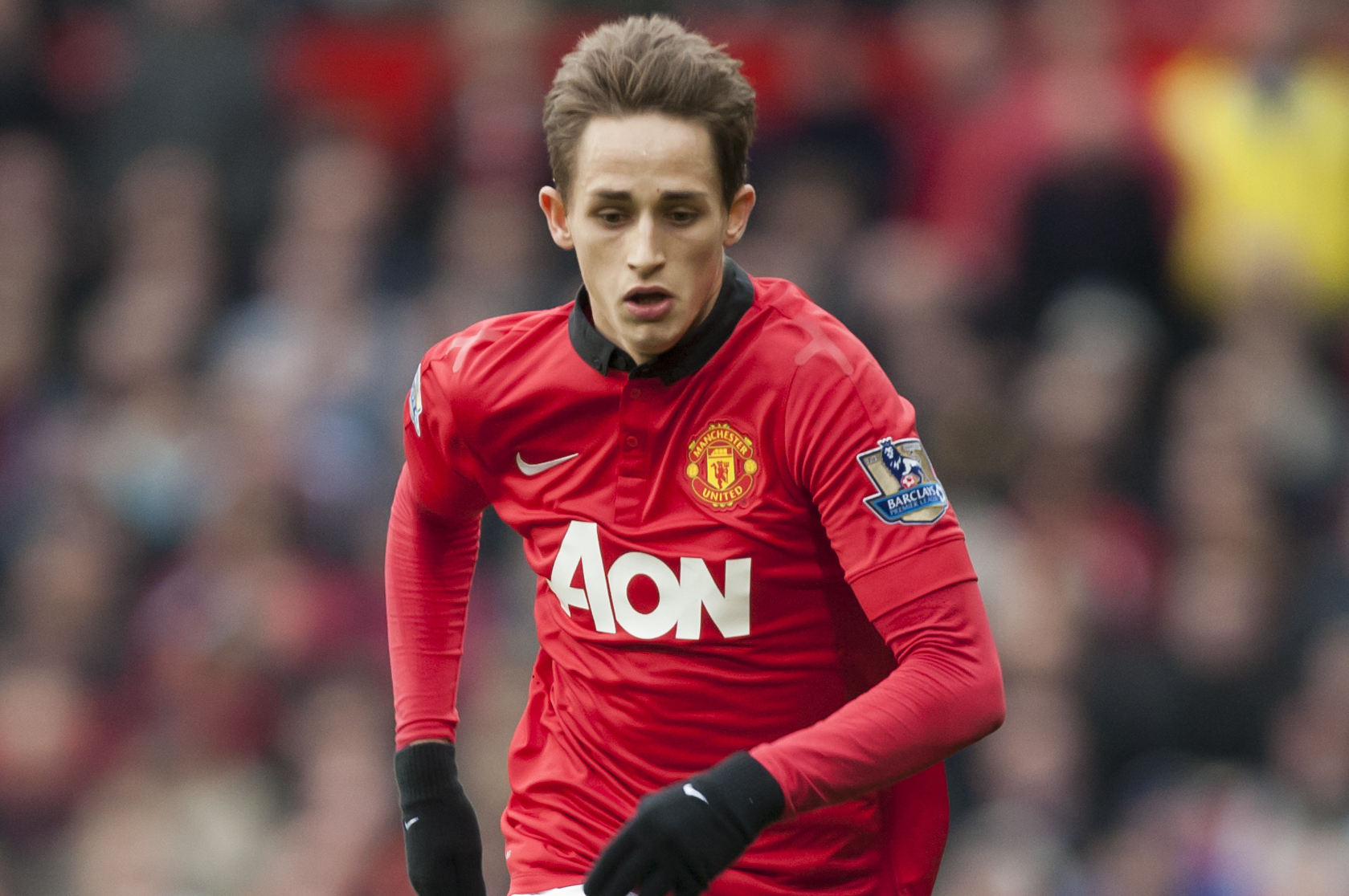 Manchester United's Adnan Januzaj during his team's English Premier League soccer match against Newcastle at Old Trafford Stadium, Manchester, England, Wednesday Dec. 7, 2013. (AP Photo/Jon Super)