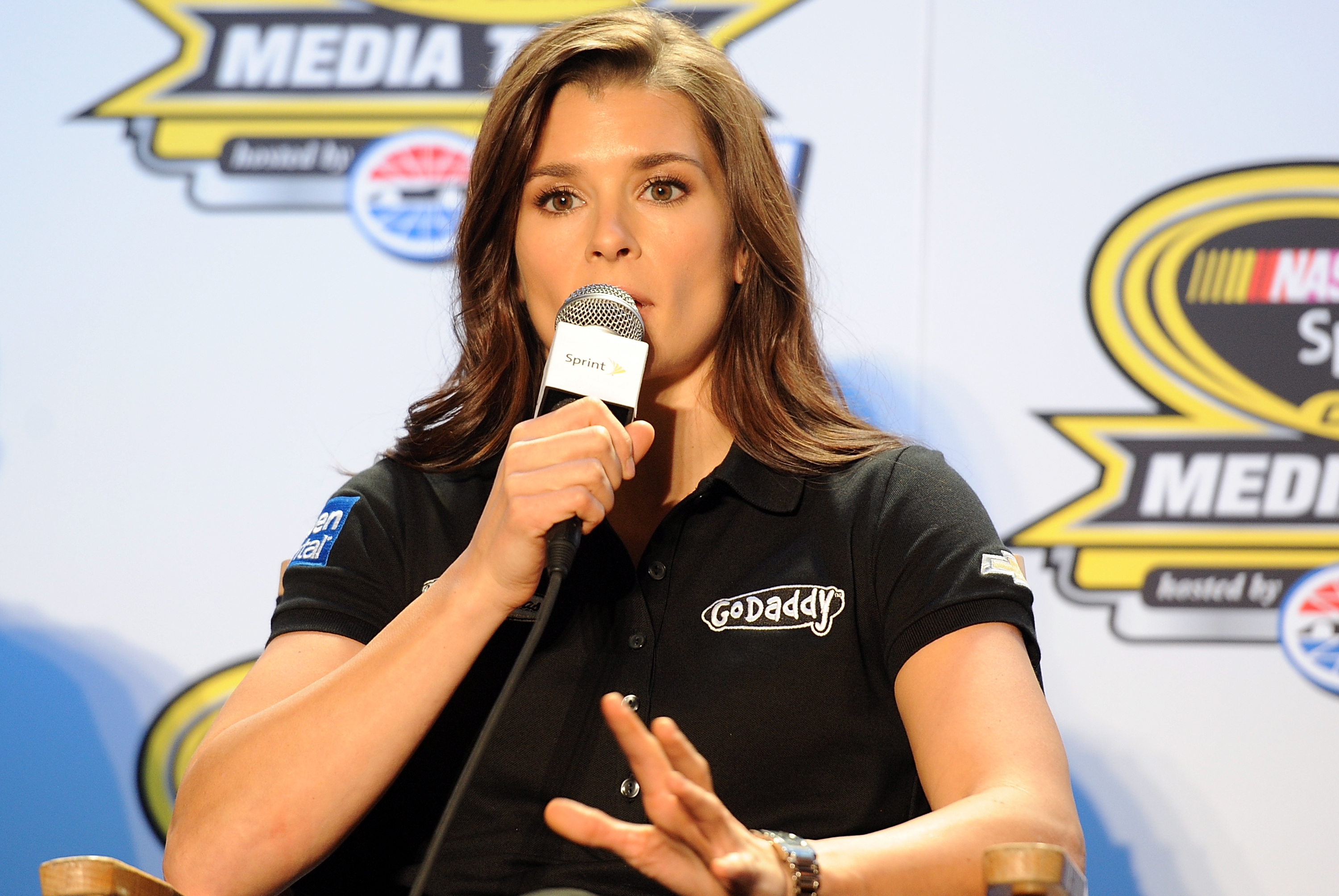 CHARLOTTE, NC - JANUARY 27:  Danica Patrick, driver of the #10 GoDaddy.com Chevrolet, speaks with the media during NASCAR Sprint Media Tour at Charlotte Convention Center on January 27, 2014 in Charlotte, North Carolina.  (Photo by Jared C. Tilton/Getty Images)
