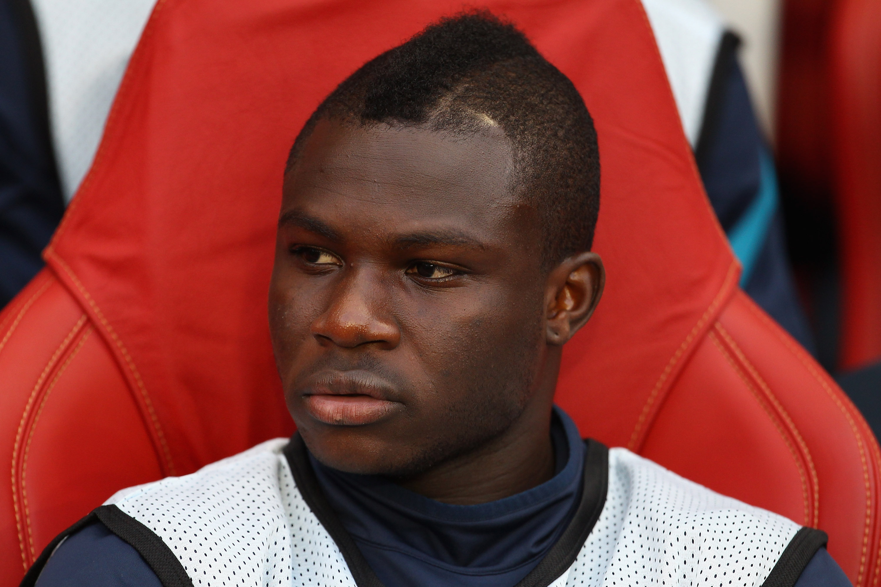 LONDON, ENGLAND - AUGUST 16:  Emmanuel Frimpong of Arsenal looks on ahead of the UEFA Champions League play-off first leg match between Arsenal and Udinese at the Emirates Stadium on August 16, 2011 in London, England.  (Photo by Julian Finney/Getty Images)