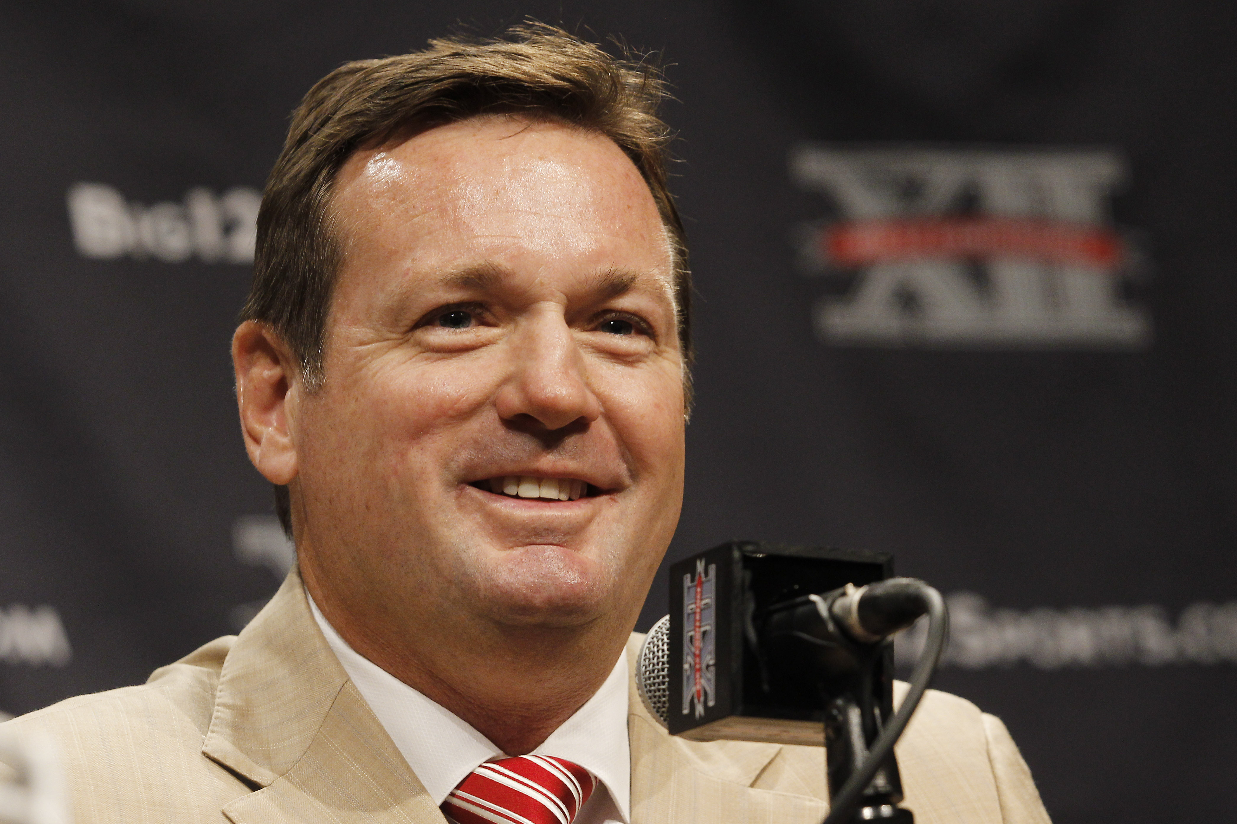 Oklahoma football coach Bob Stoops comments on his team during the NCAA college Big 12 Conference Football Media Days Tuesday, July 23, 2013 in Dallas.  (AP Photo/Tim Sharp)