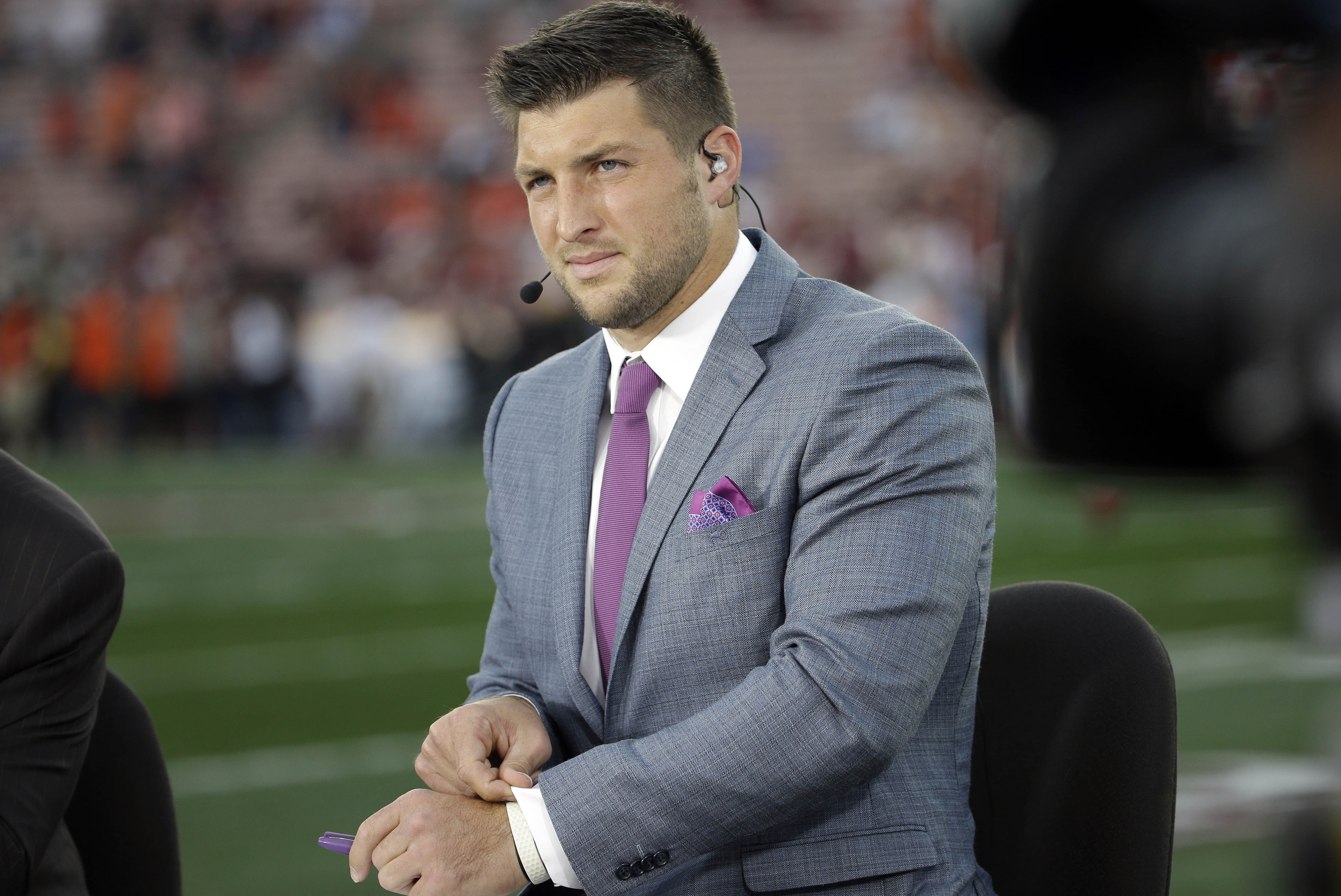 FILE - In this Jan. 6, 2014 file, photo shows Tim Tebow on ESPN before the NCAA BCS National Championship college football game between Auburn and Florida State in Pasadena, Calif. Tebow will be a special guest on ABC's