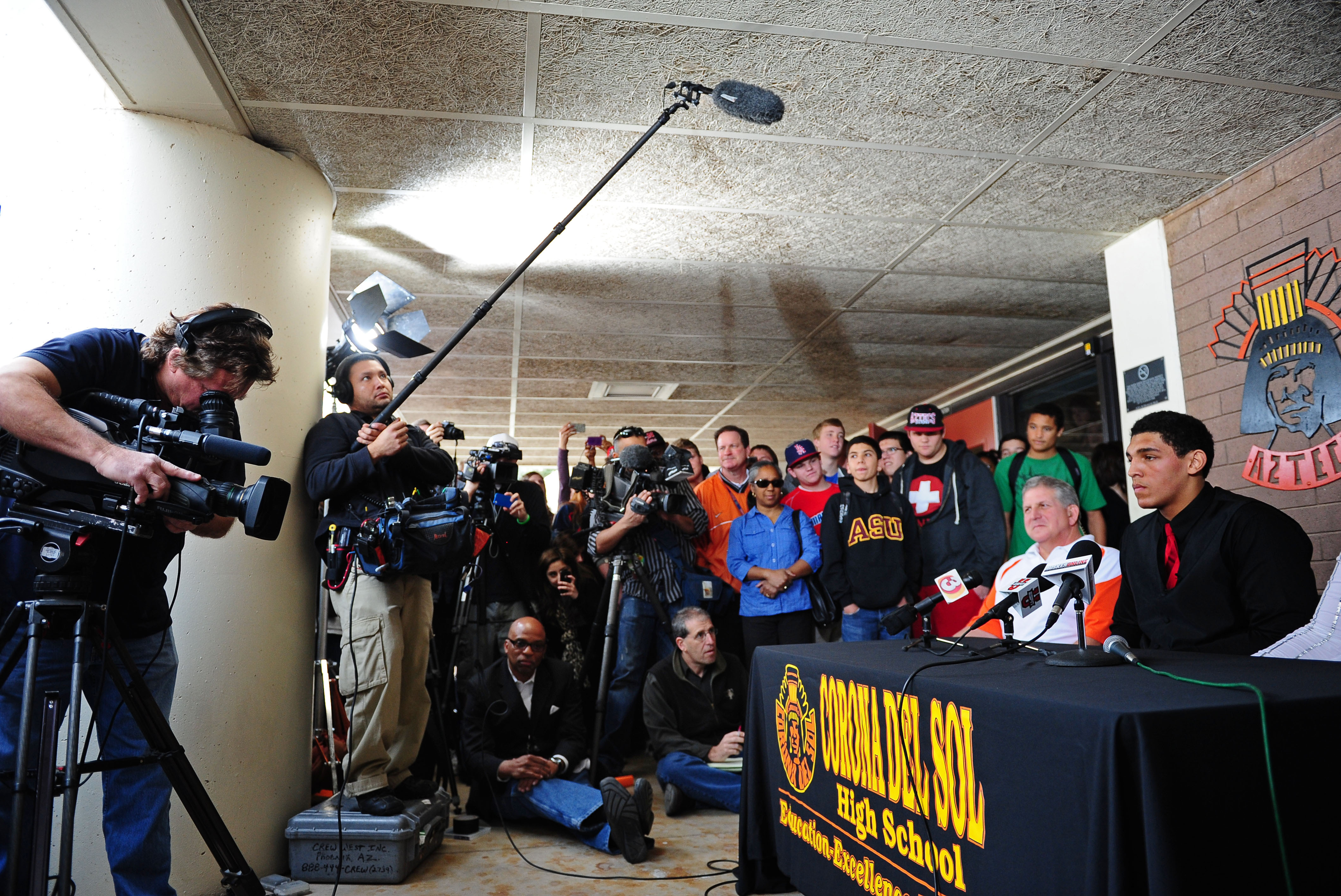 Feb. 1, 2012; Tempe AZ, USA; Corona del Sol Aztecs offensive lineman Andrus Peat (right) speaks at a press conference at Corona del Sol High School to announce his decision to play college football for the Stanford Cardinal. Mandatory Credit: Mark J. Rebilas-USA TODAY Sports