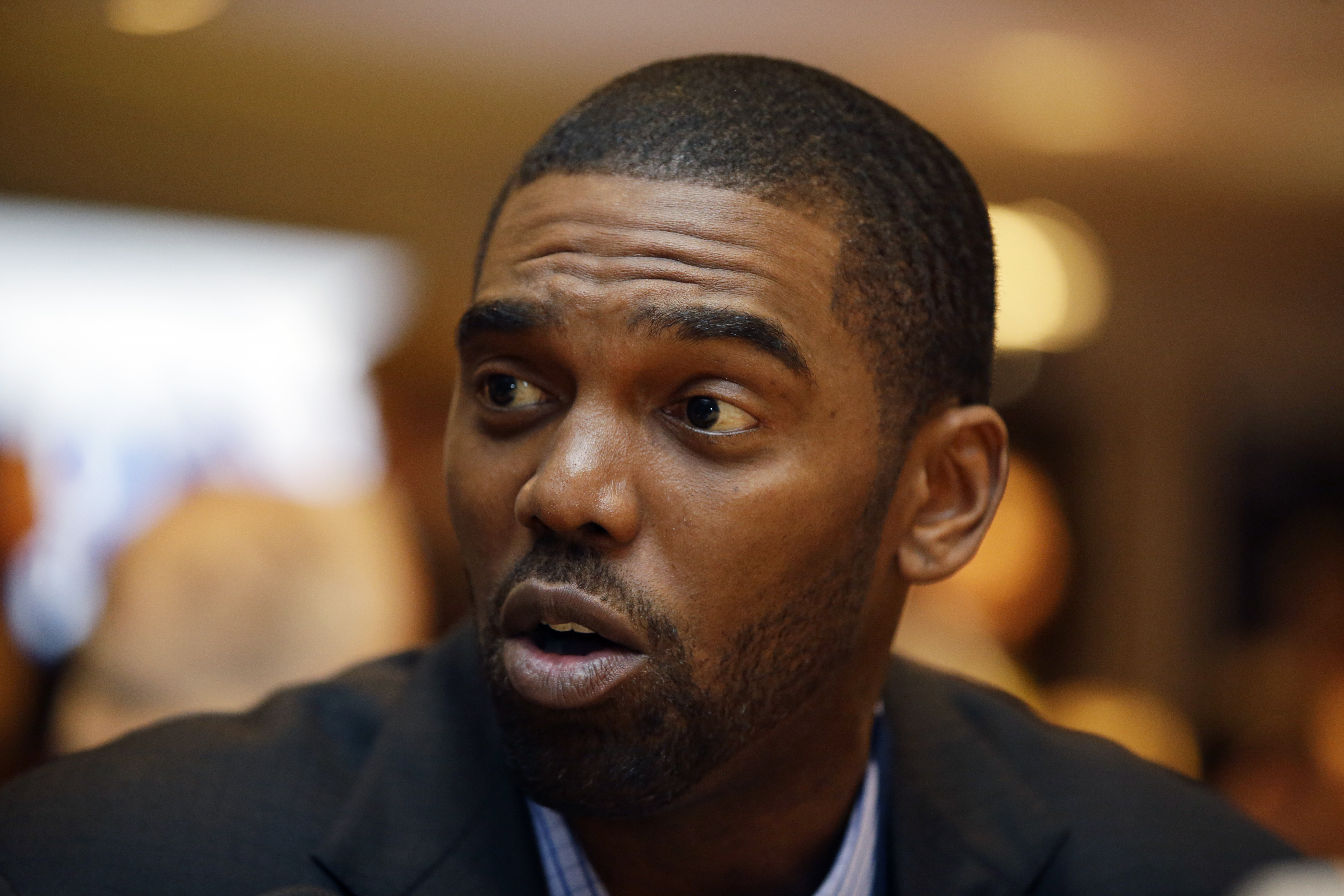 Randy Moss speaks during an interview at the NFL Super Bowl XLVIII media center, Tuesday, Jan. 28, 2014, in New York. (AP Photo/Matt Slocum)