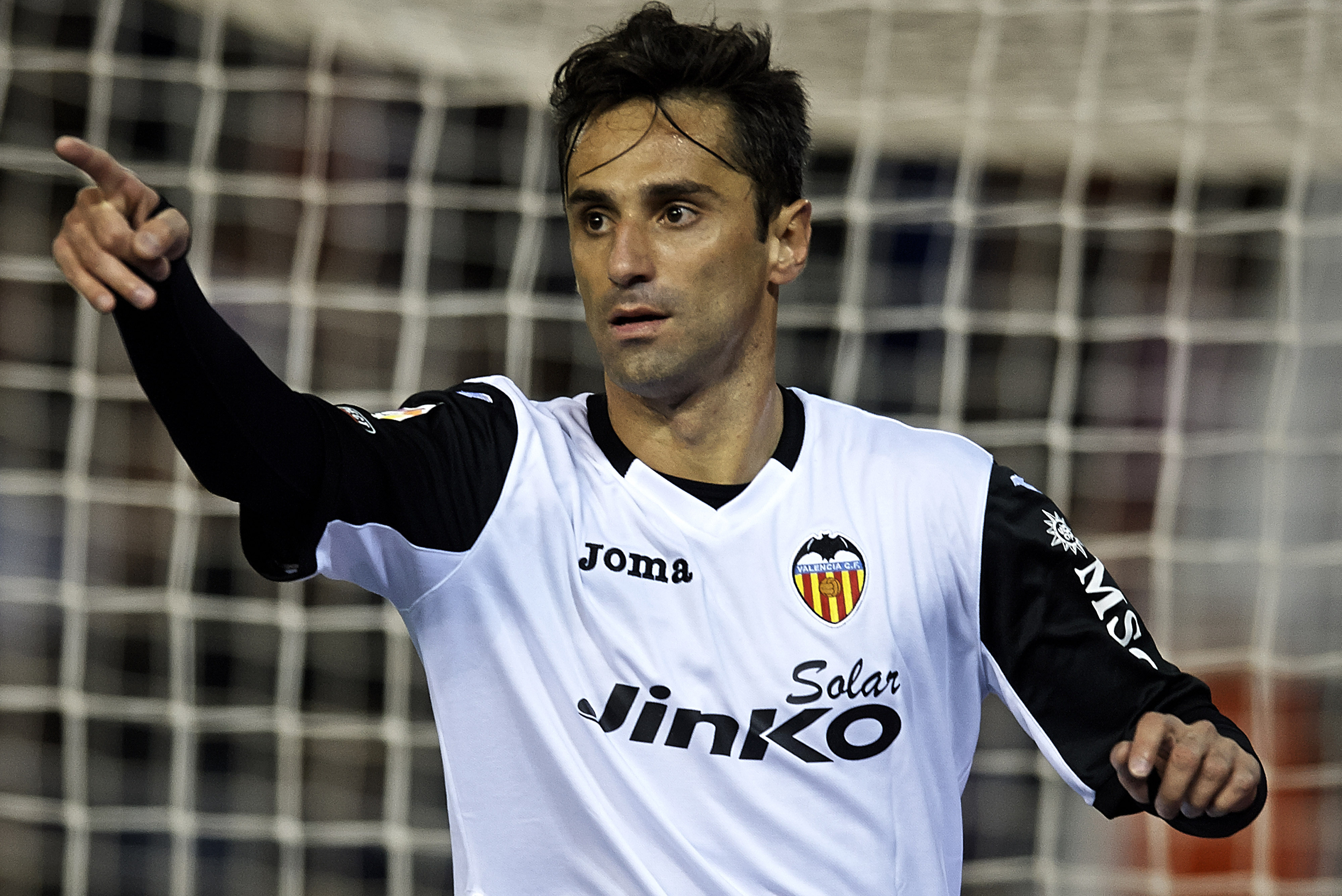VALENCIA, SPAIN - DECEMBER 01:  Jonas of Valencia celebrates after scoring during the La Liga match between Valencia CF  and CA Osasuna at Estadio Mestalla on December 01, 2013 in Valencia, Spain.  (Photo by Manuel Queimadelos Alonso/Getty Images)